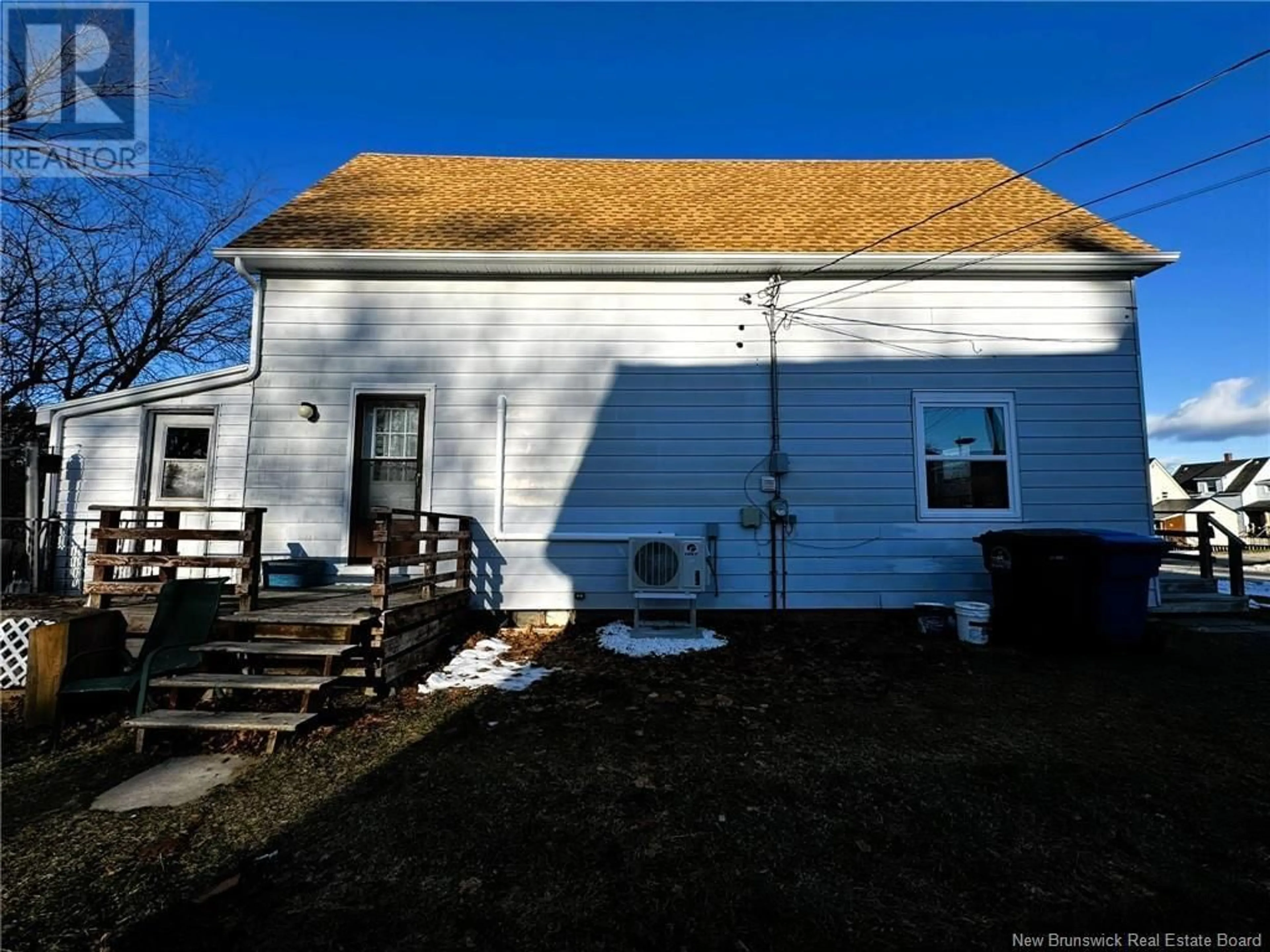 Home with vinyl exterior material, street for 16 Warren Avenue, Miramichi New Brunswick E1N2J3