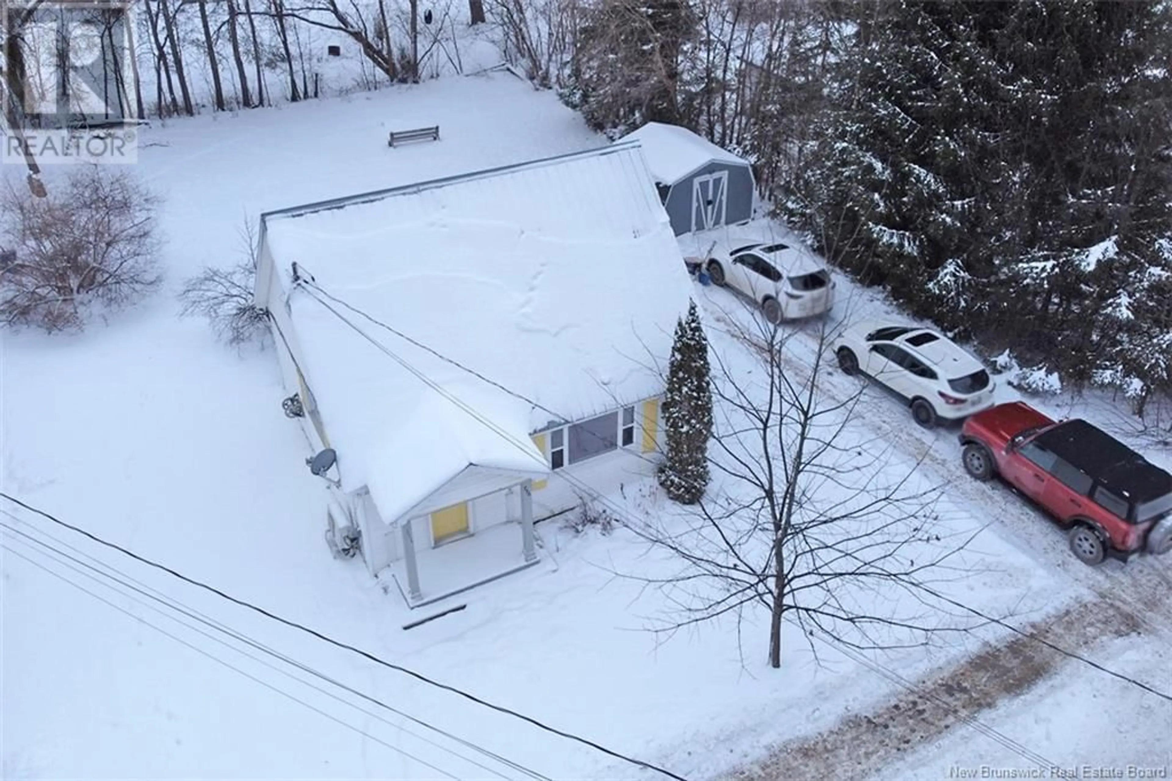 A pic from outside/outdoor area/front of a property/back of a property/a pic from drone, street for 736 MacLaren Avenue, Fredericton New Brunswick E3A3L5