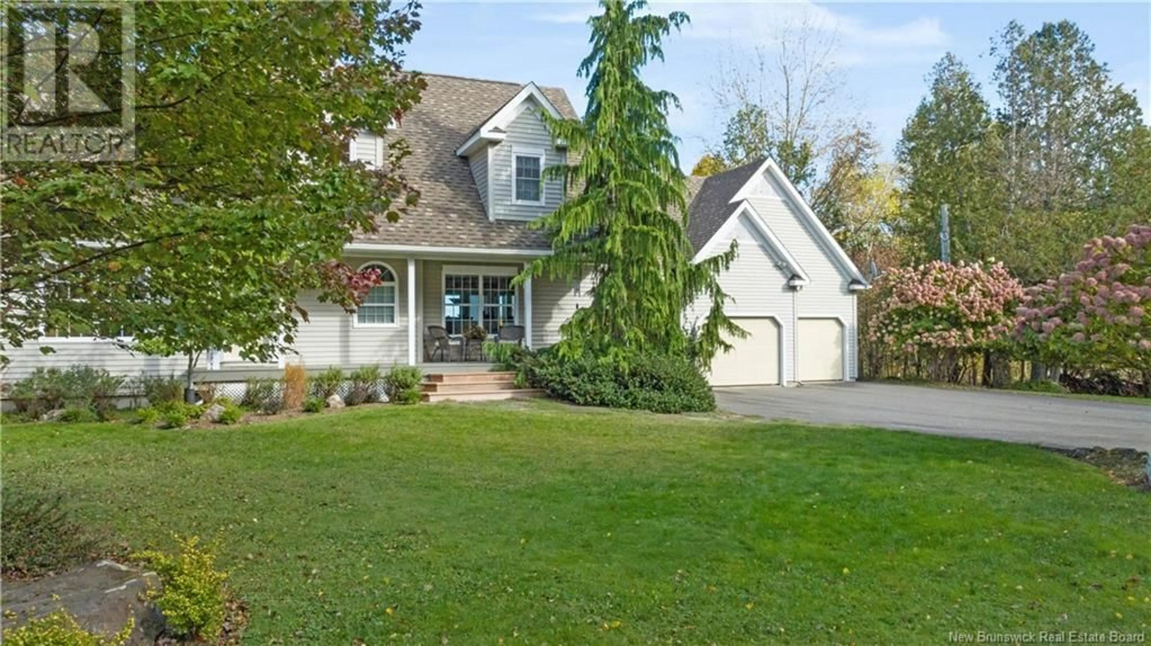 Home with vinyl exterior material, street for 144 Harkness Road, Chamcook New Brunswick E5B3G1