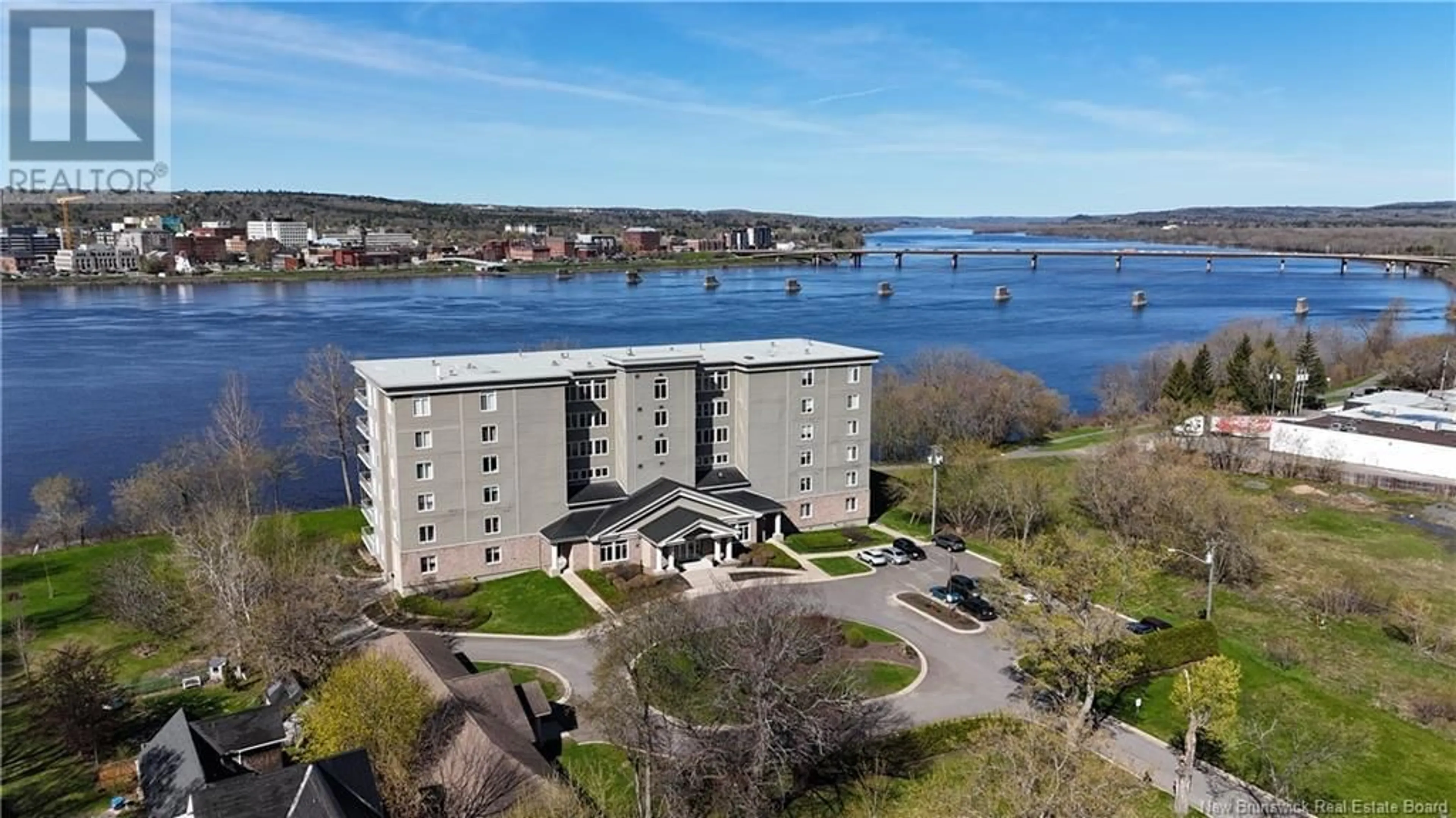 A pic from outside/outdoor area/front of a property/back of a property/a pic from drone, water/lake/river/ocean view for 104 - 1 SOUTHVIEW LANE, Fredericton New Brunswick E3A5V3