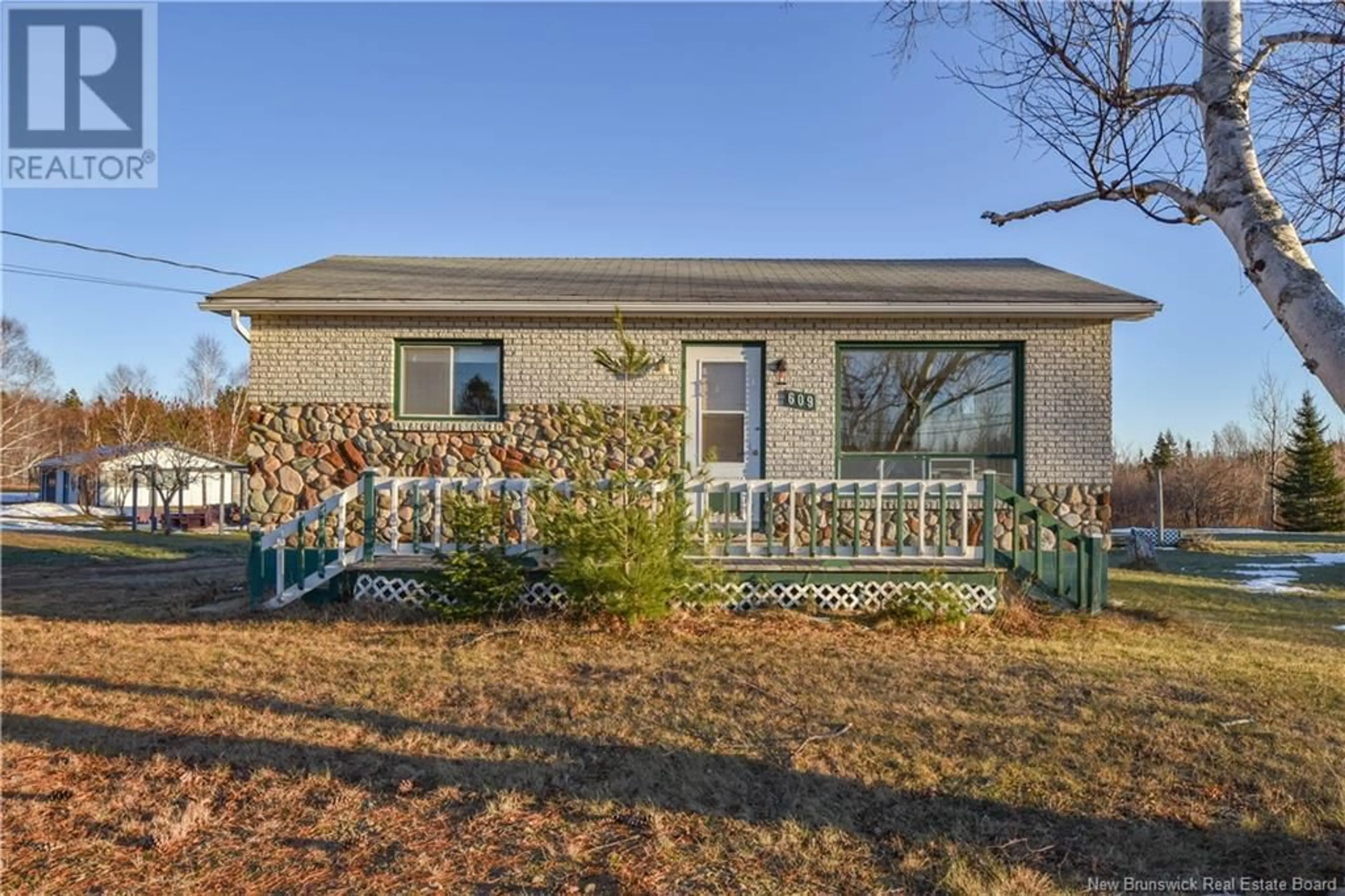 Home with vinyl exterior material, street for 609 des Acadiens Boulevard, Bertrand New Brunswick E1W1G5