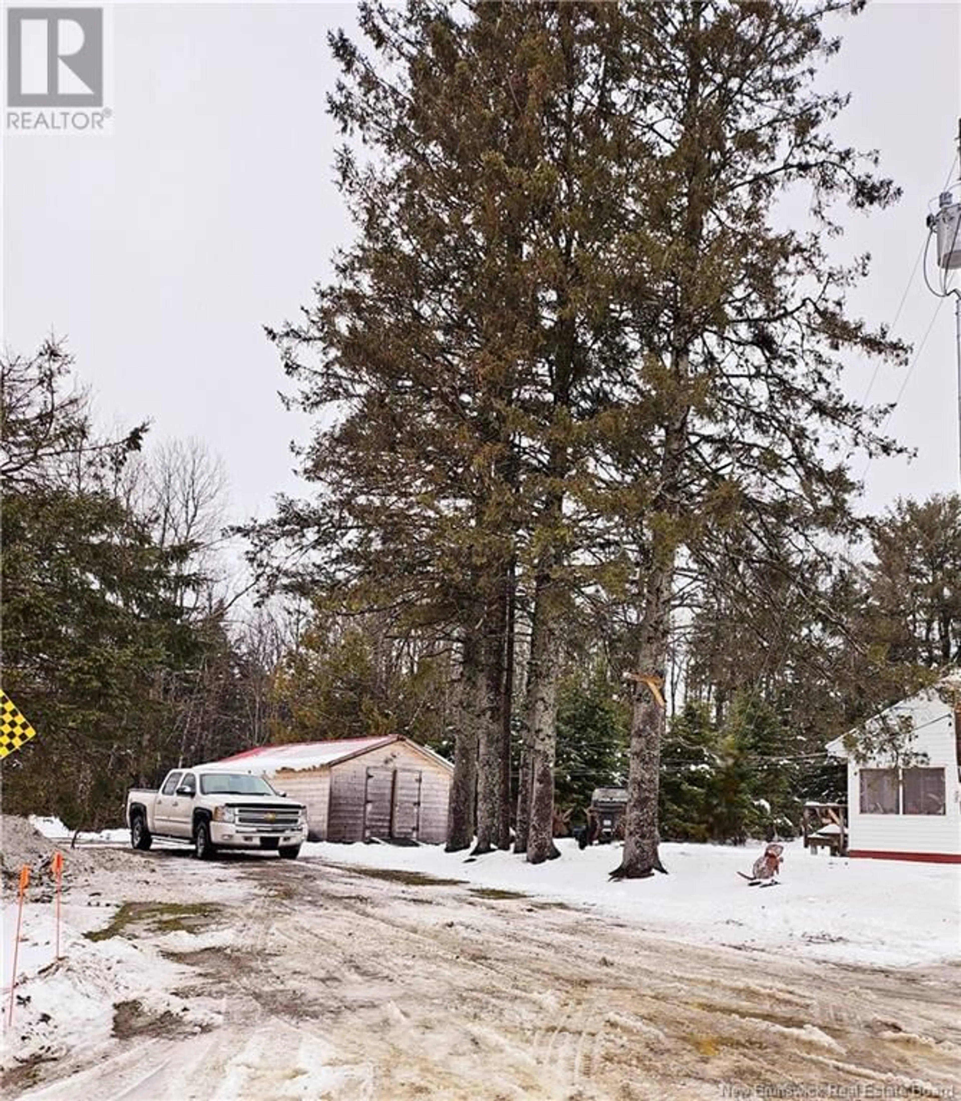 A pic from outside/outdoor area/front of a property/back of a property/a pic from drone, street for 49 Shannon Road, California Settlement New Brunswick E3Z1Z7