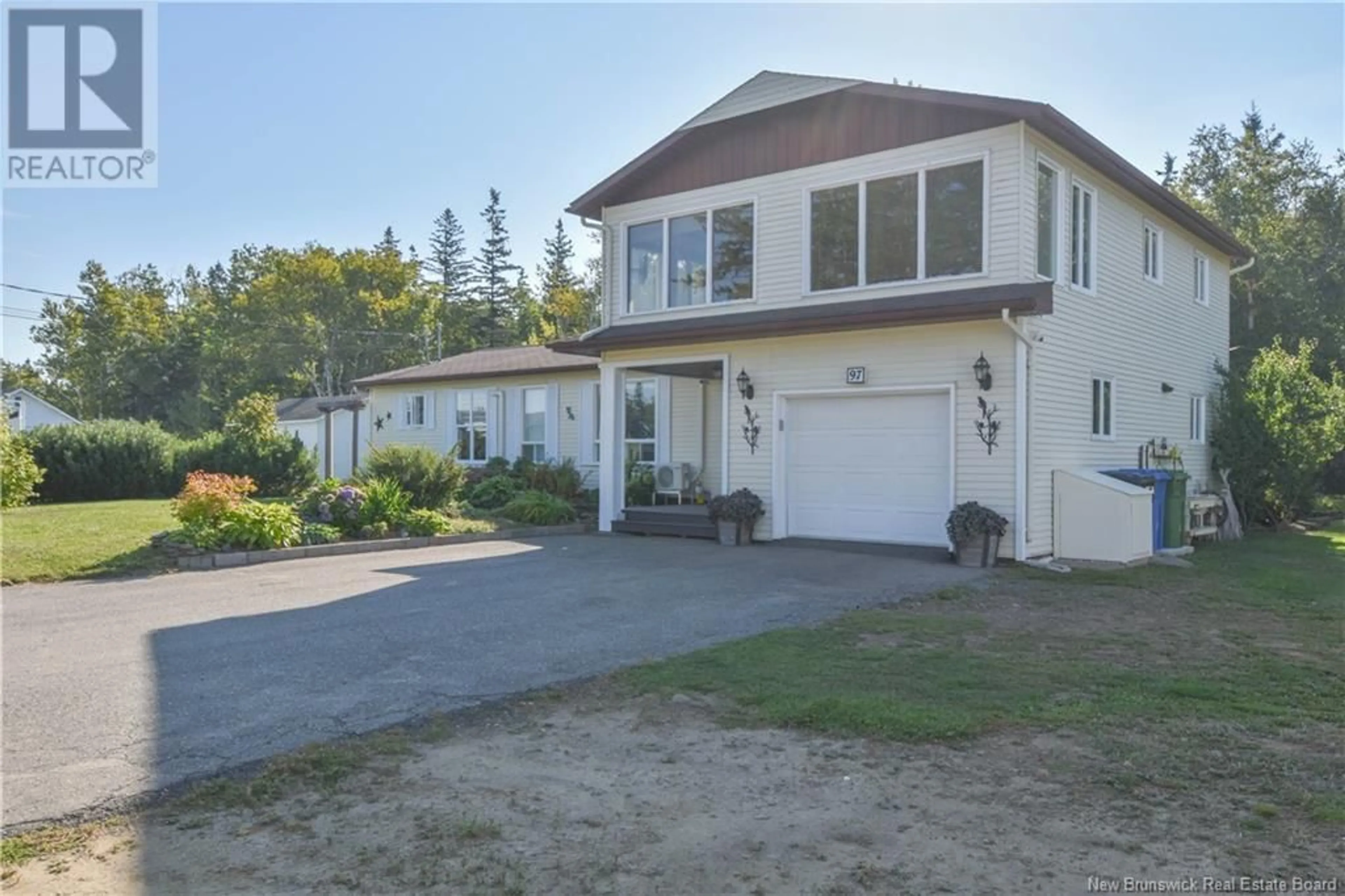 A pic from outside/outdoor area/front of a property/back of a property/a pic from drone, street for 97 rue Acadie Street, Grande-Anse New Brunswick E8N1A1