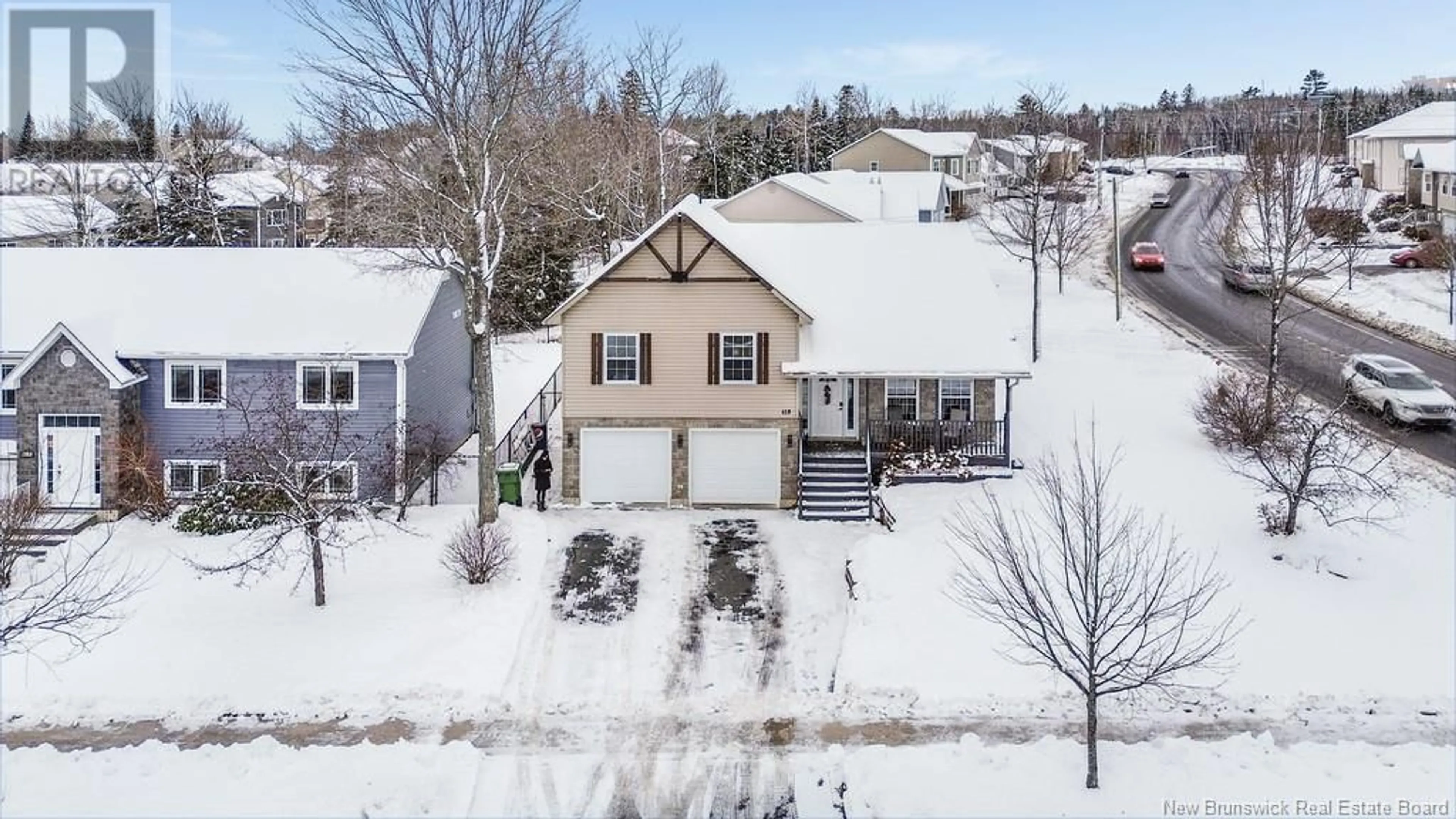 A pic from outside/outdoor area/front of a property/back of a property/a pic from drone, street for 419 Crocket Street, Fredericton New Brunswick E3A0G4