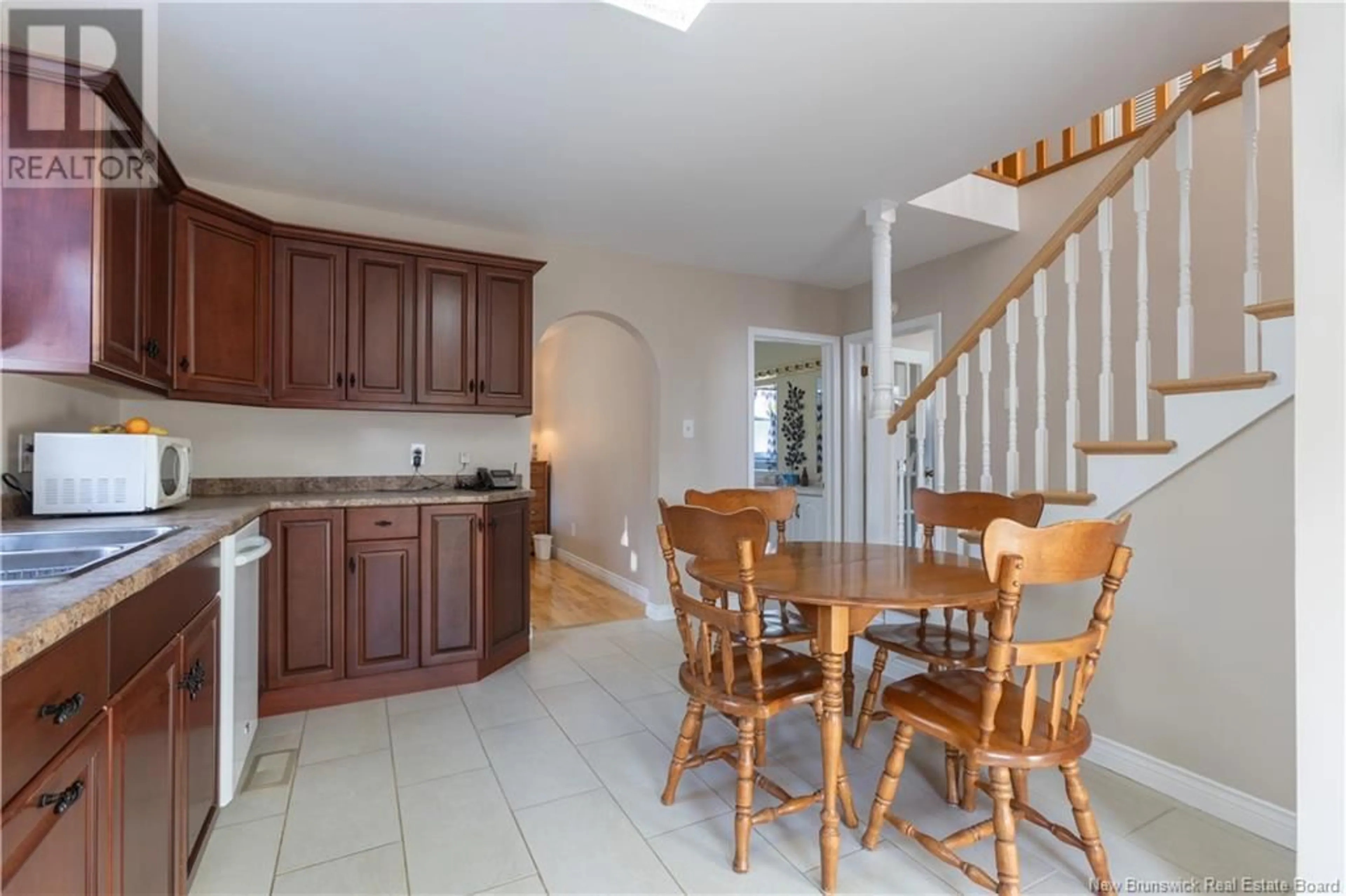 Open concept kitchen, ceramic/tile floor for 382 McLaughlin Drive, Moncton New Brunswick E1A4R4