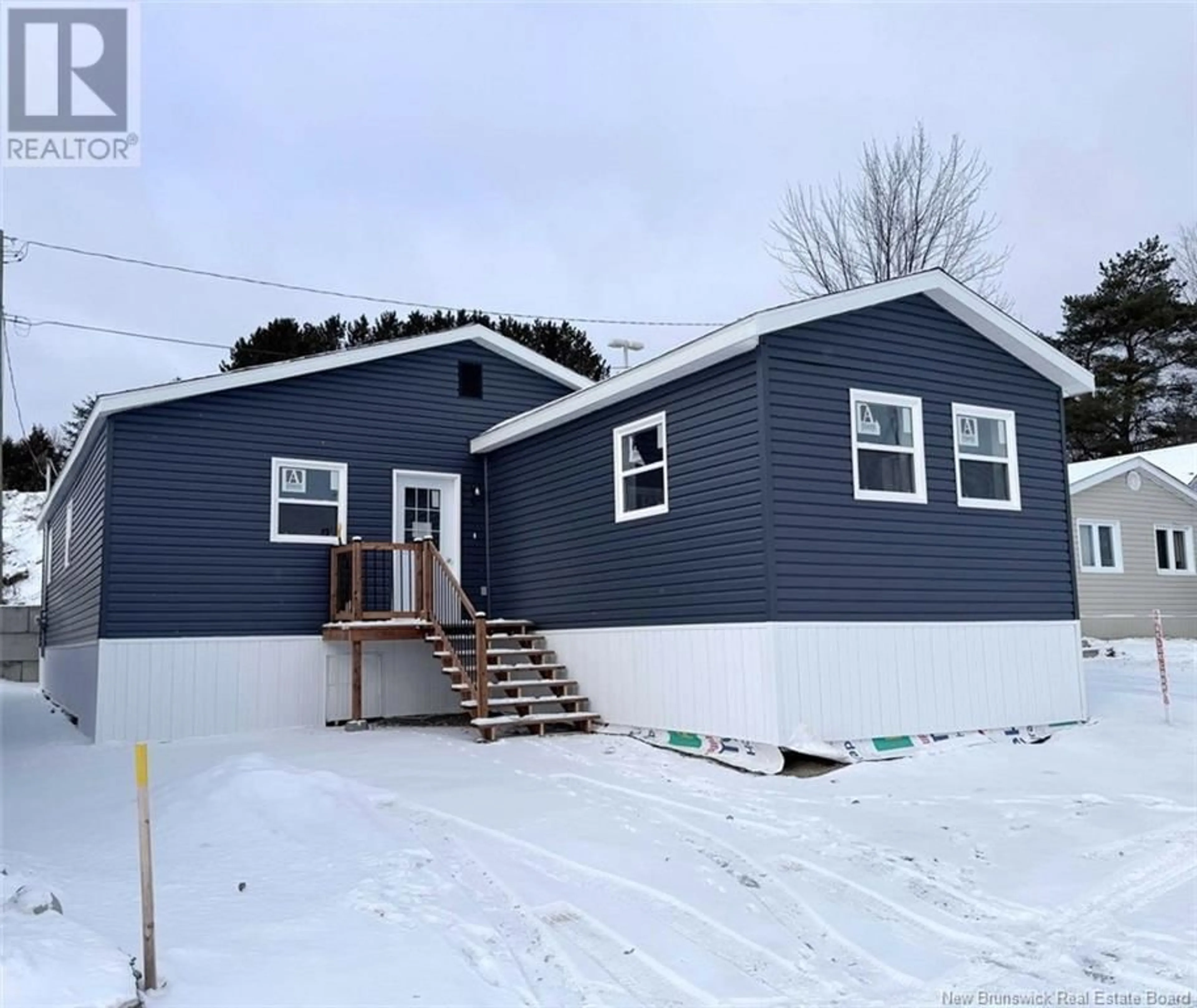 Home with vinyl exterior material, street for 6 Gagnon Avenue, Edmundston New Brunswick E3V3H8