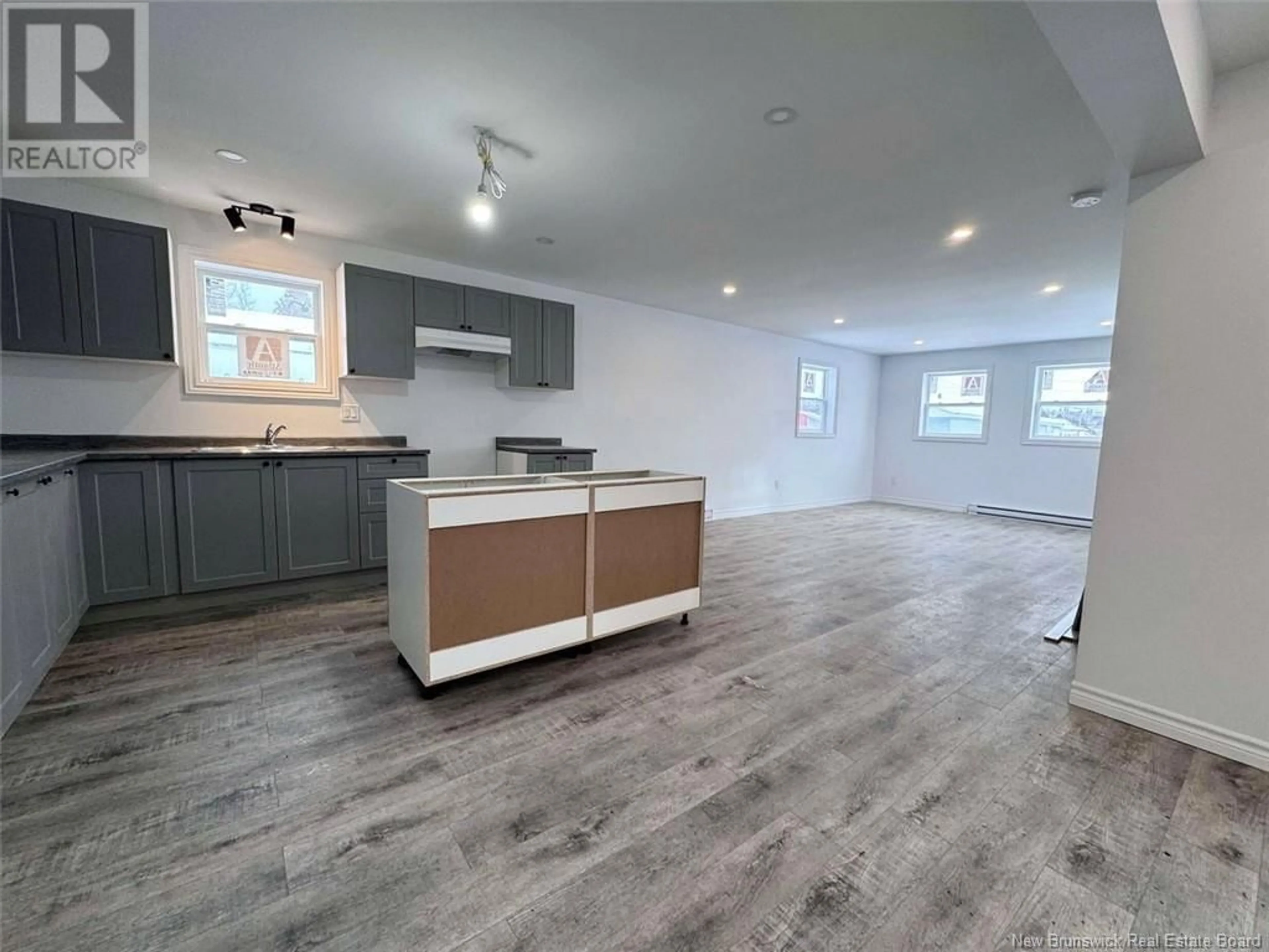 Open concept kitchen, unknown for 6 Gagnon Avenue, Edmundston New Brunswick E3V3H8