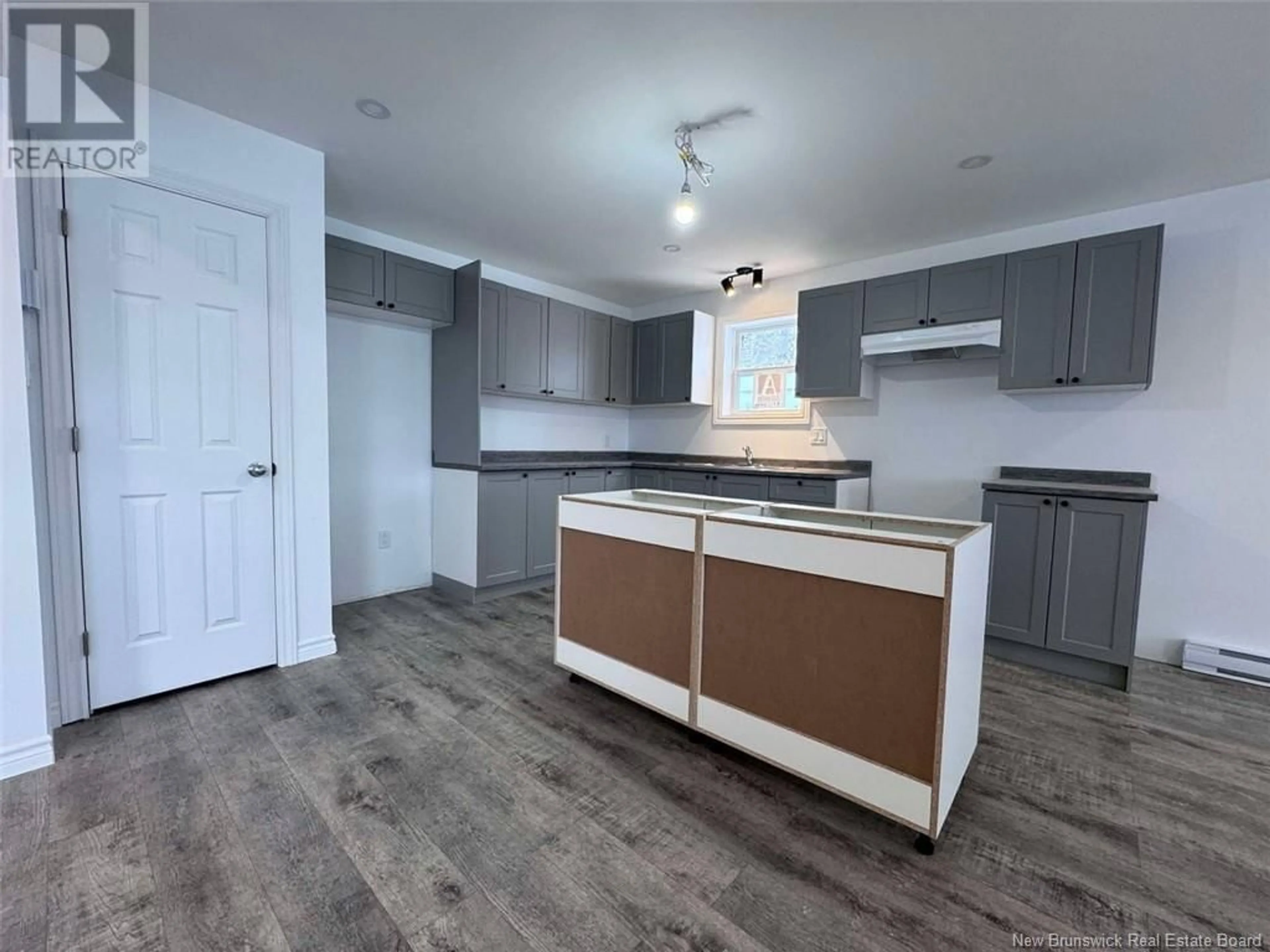 Open concept kitchen, unknown for 6 Gagnon Avenue, Edmundston New Brunswick E3V3H8