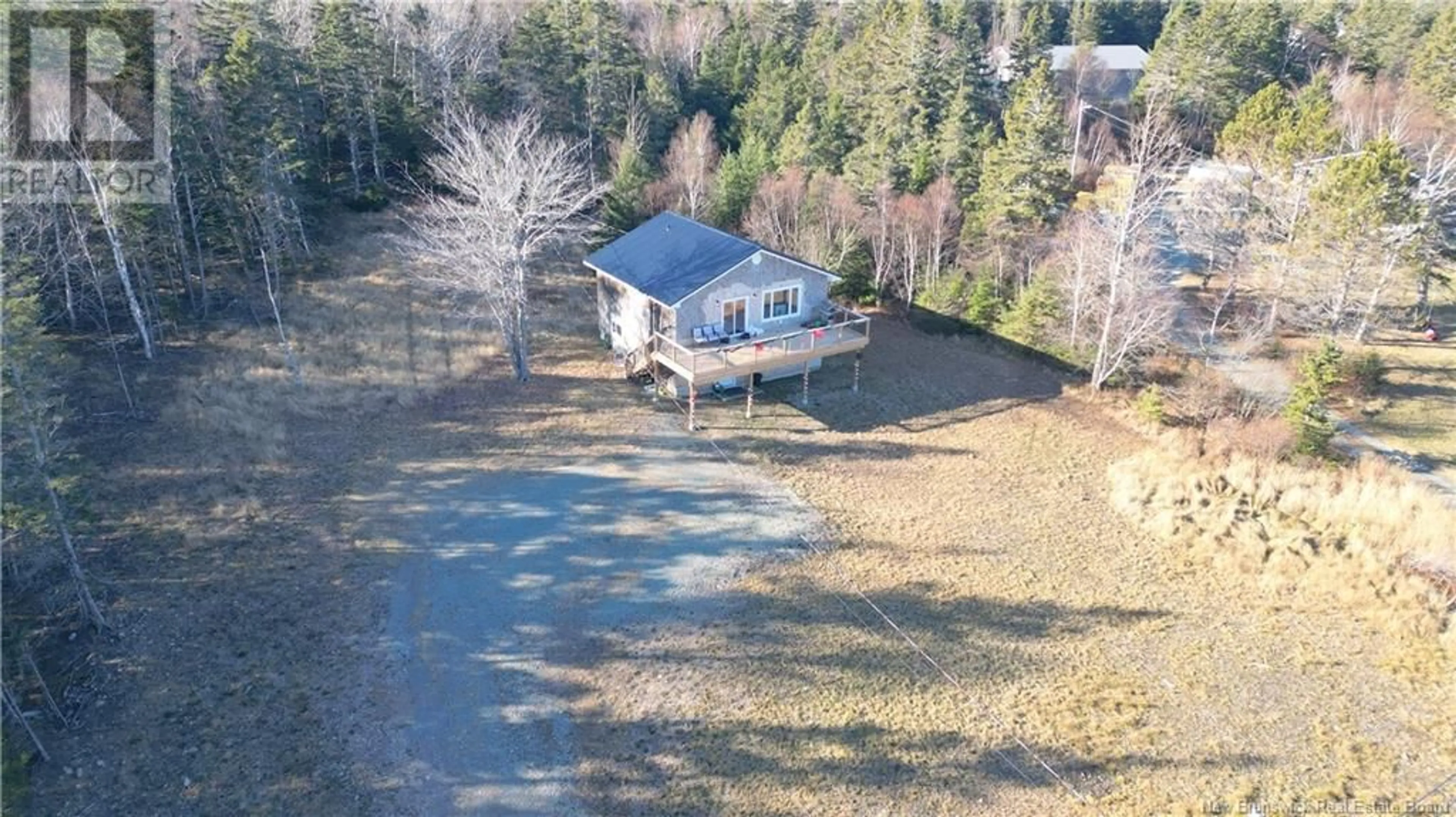 A pic from outside/outdoor area/front of a property/back of a property/a pic from drone, water/lake/river/ocean view for 235 WHISTLE ROAD, Grand Manan New Brunswick E5G1B4