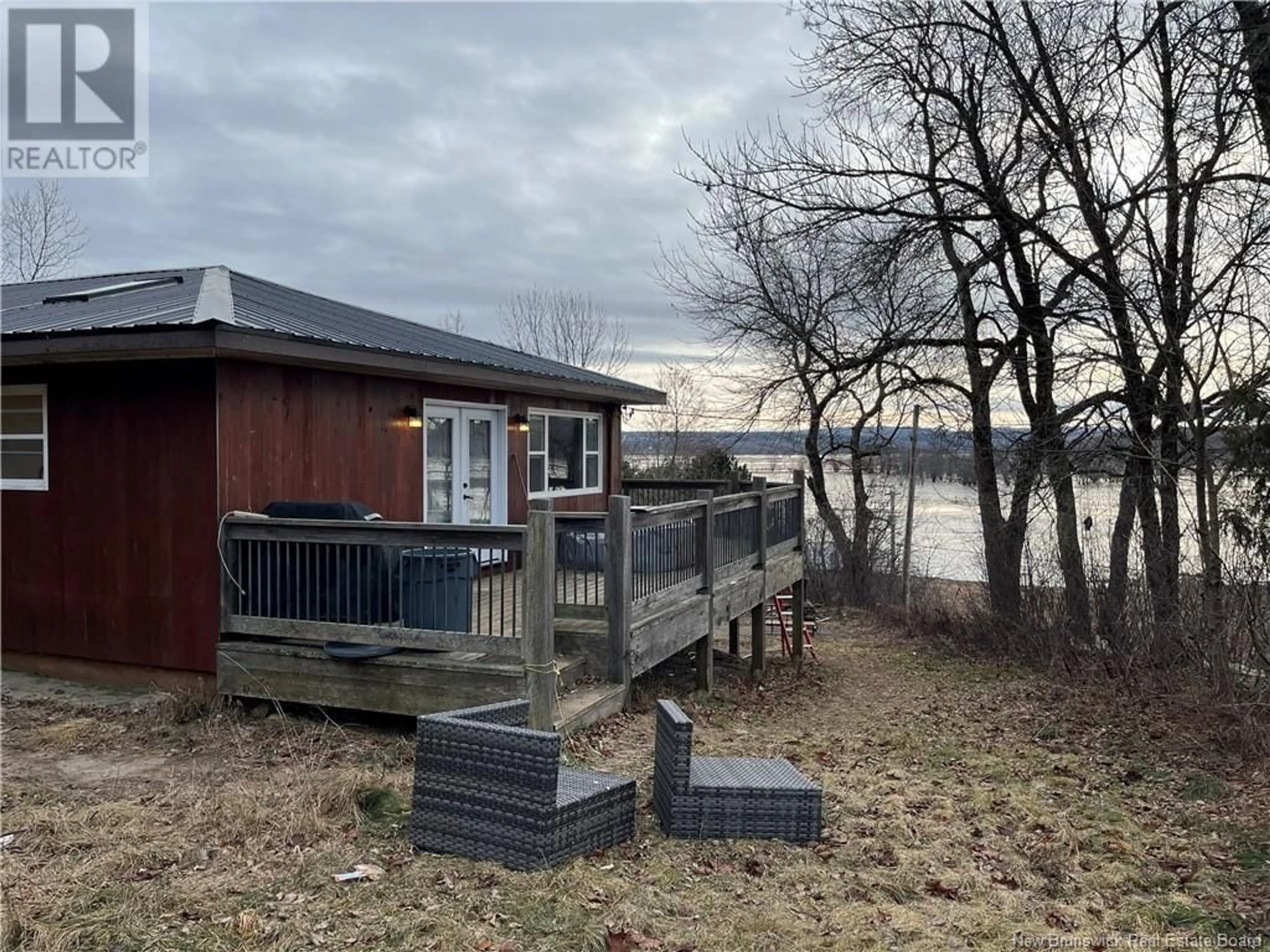 A pic from outside/outdoor area/front of a property/back of a property/a pic from drone, water/lake/river/ocean view for 116 Norton Shore Road, Hampton New Brunswick E2N6J8