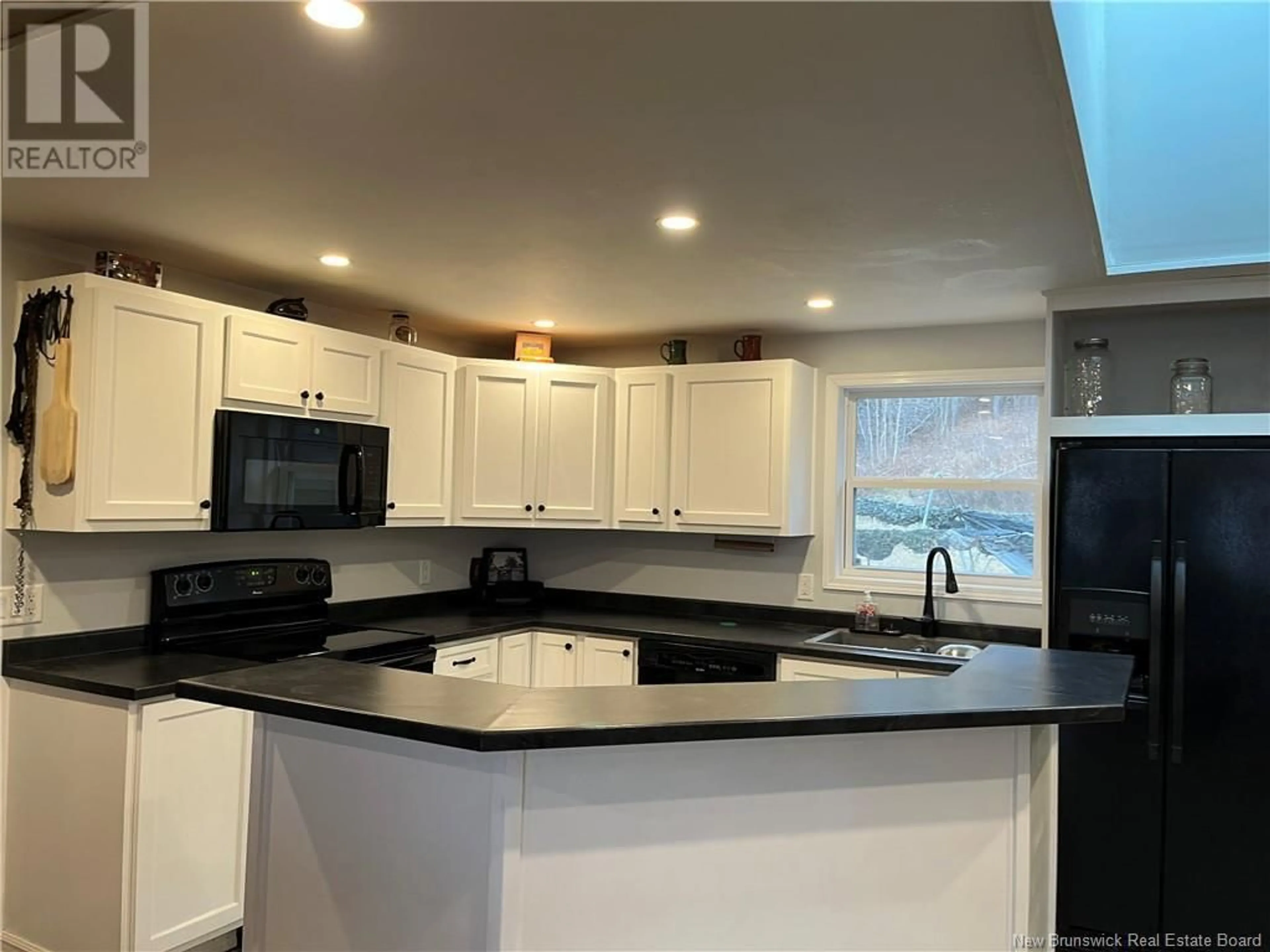 Open concept kitchen, ceramic/tile floor for 116 Norton Shore Road, Hampton New Brunswick E2N6J8