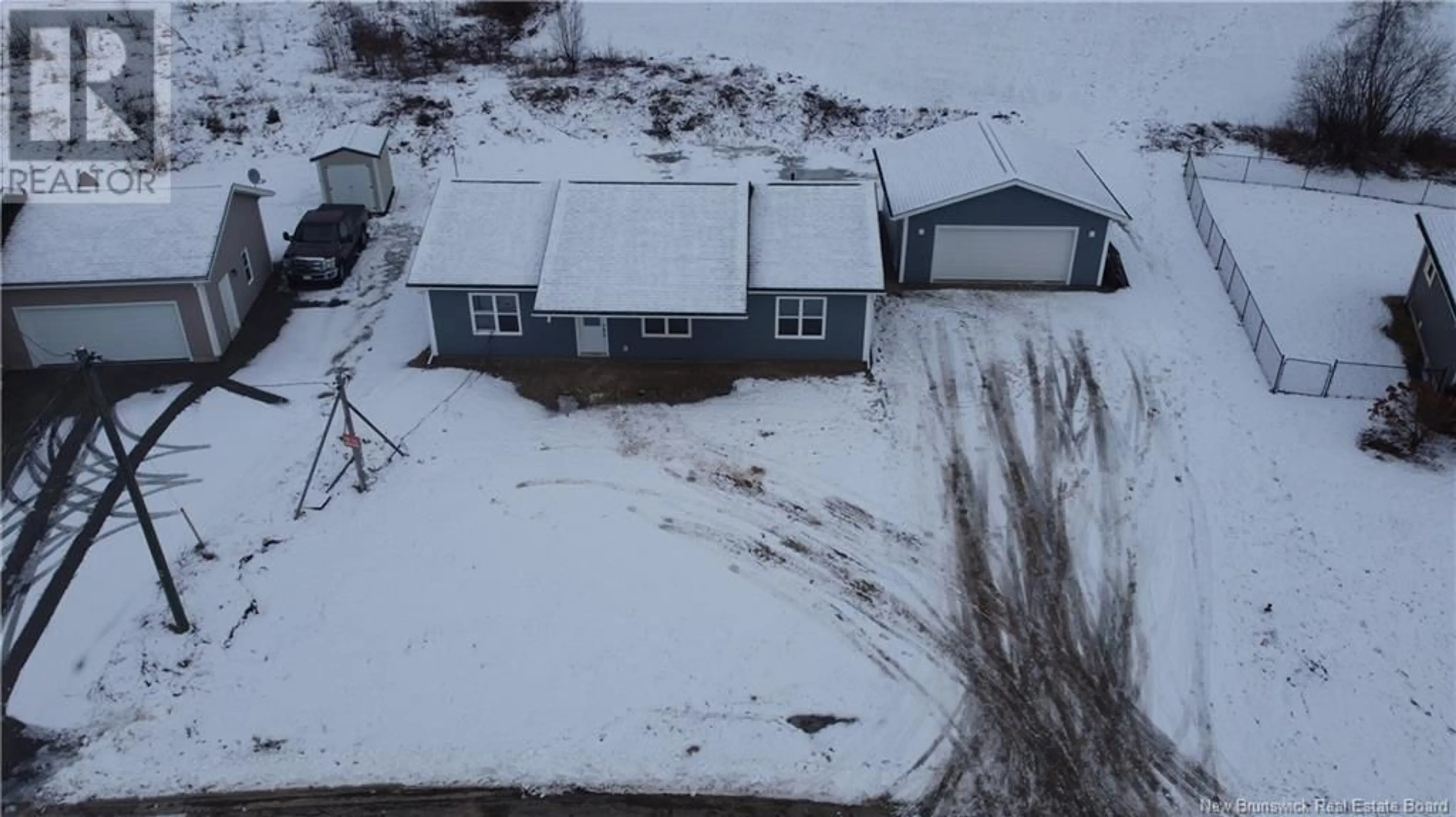 A pic from outside/outdoor area/front of a property/back of a property/a pic from drone, unknown for 110 Maxwell Street, Woodstock New Brunswick E7M0B5