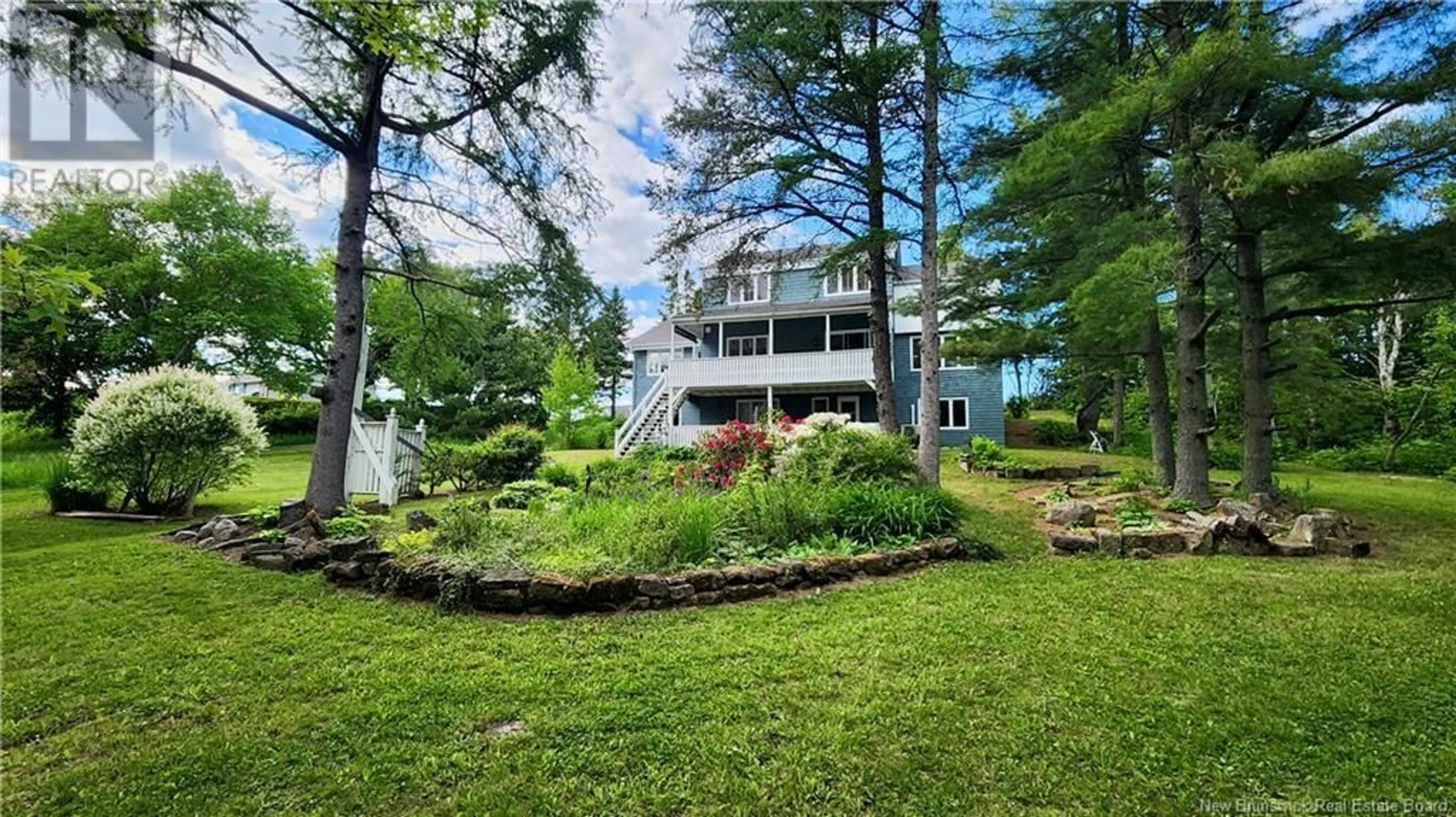 A pic from outside/outdoor area/front of a property/back of a property/a pic from drone, water/lake/river/ocean view for 111 Du Couvent, Bouctouche New Brunswick E4S3B8