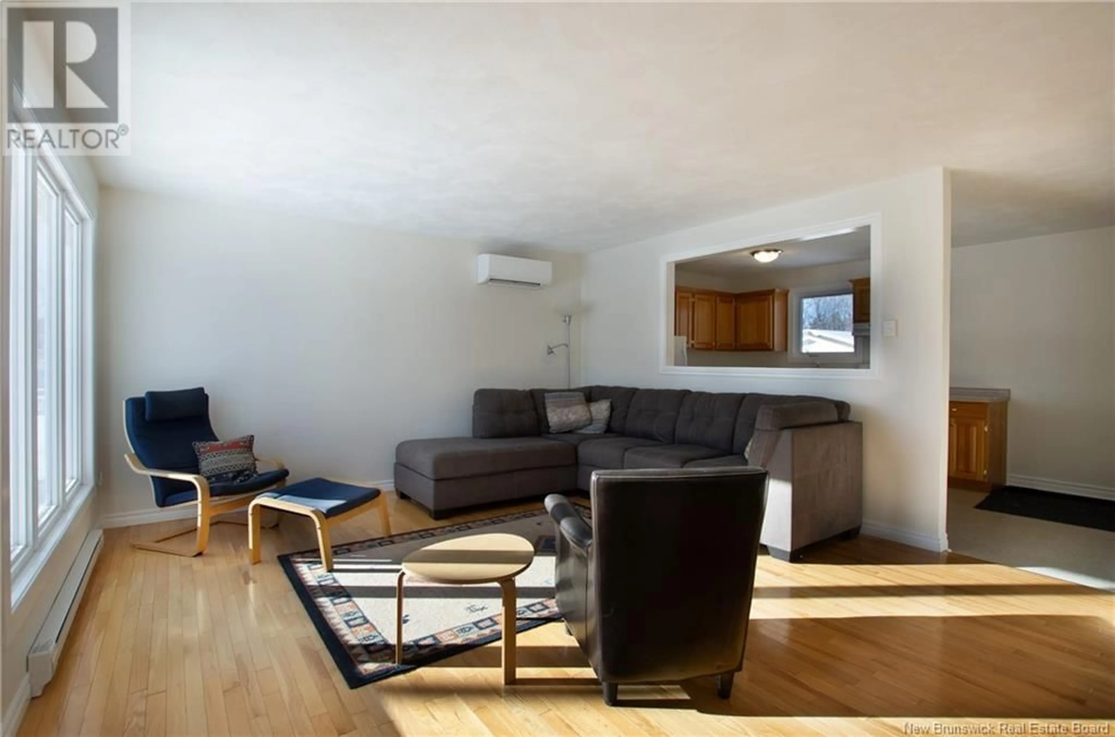 Living room with furniture, wood/laminate floor for 193 Noel Street, Moncton New Brunswick E1C8V1