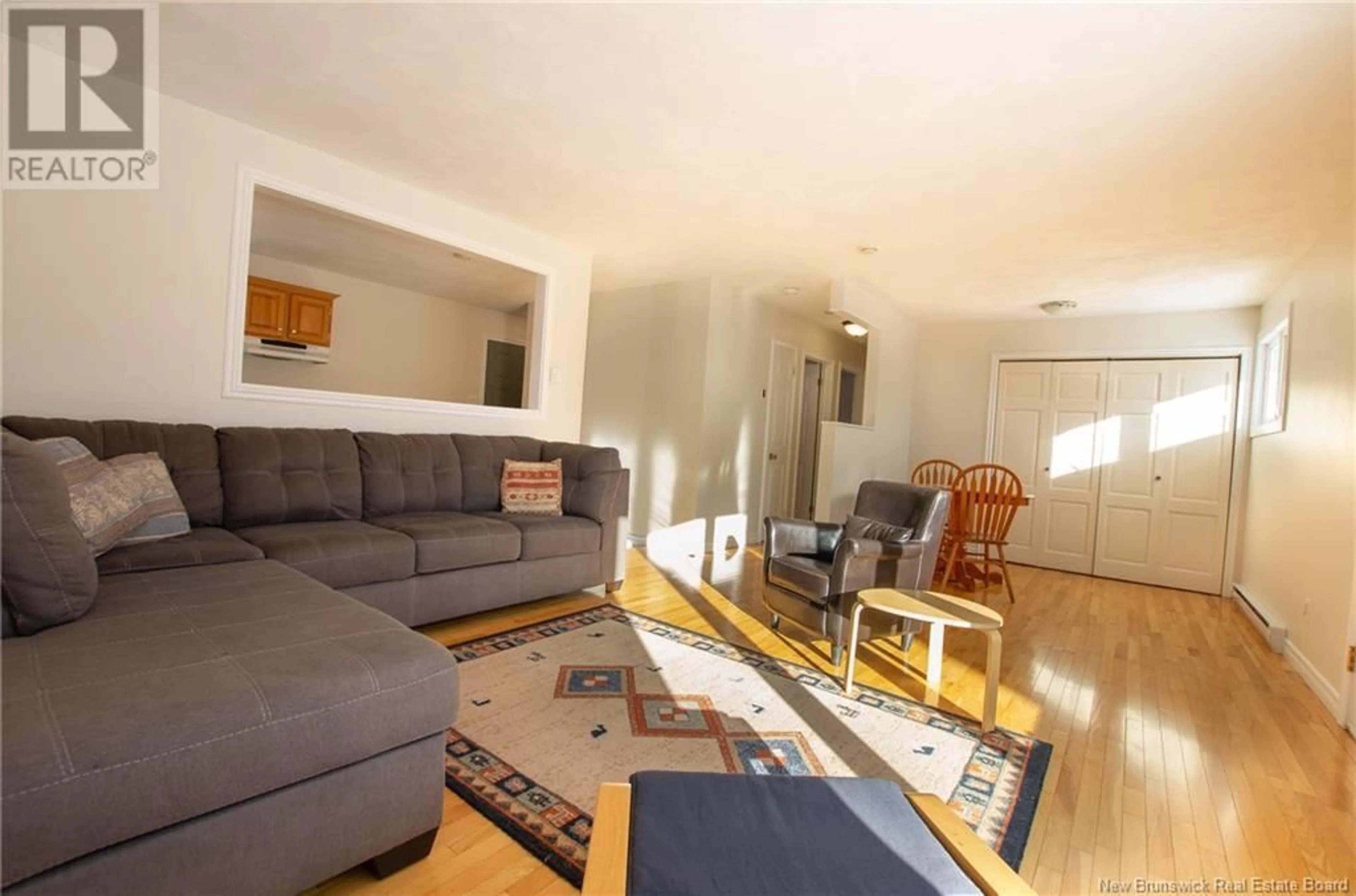 Living room with furniture, wood/laminate floor for 193 Noel Street, Moncton New Brunswick E1C8V1