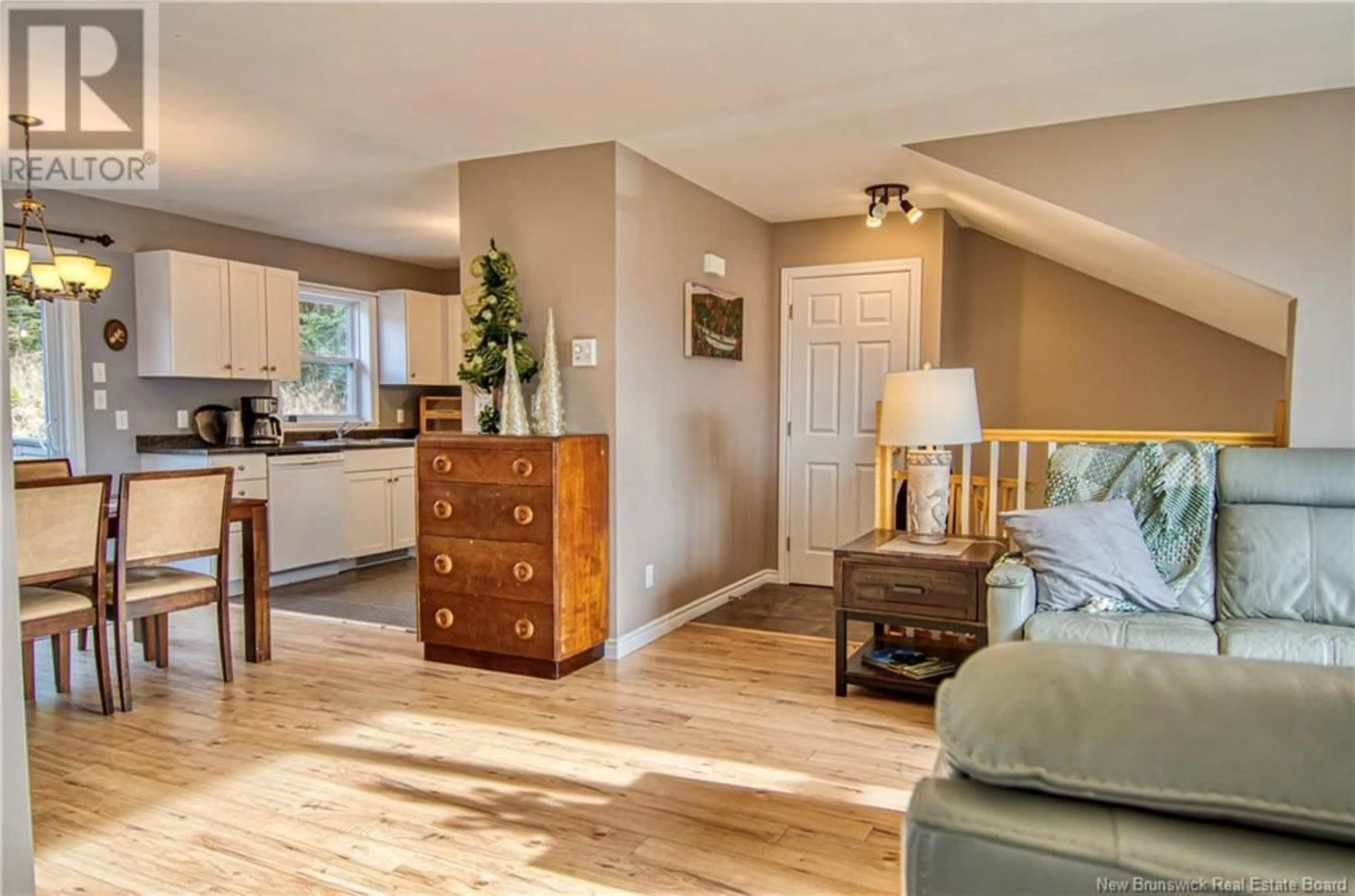 Living room with furniture, wood/laminate floor for 113 Glen Road, Saint John New Brunswick E2H2E2