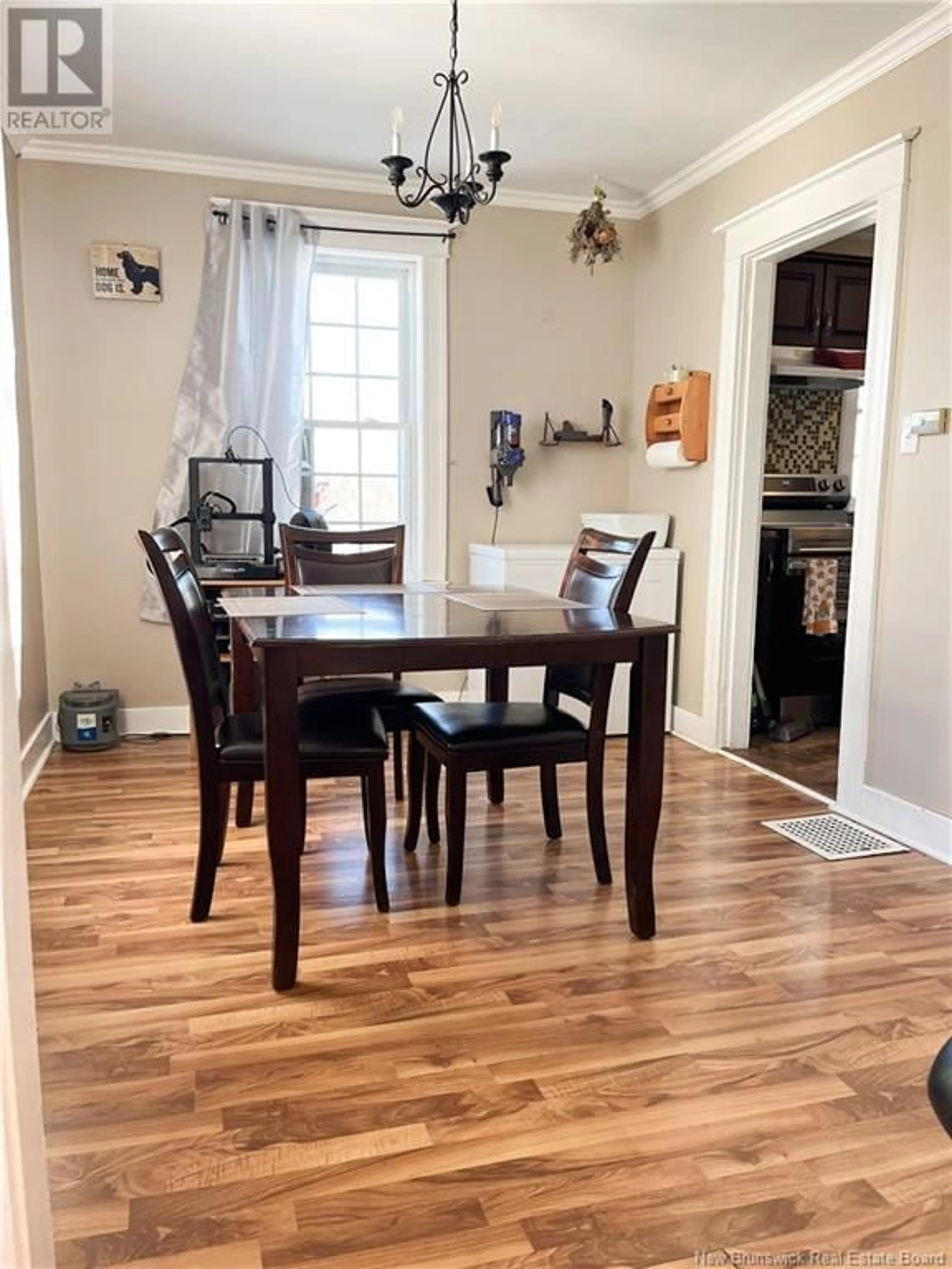 Dining room, wood/laminate floor for 129 MAIN Street, Blackville New Brunswick E9B2E6