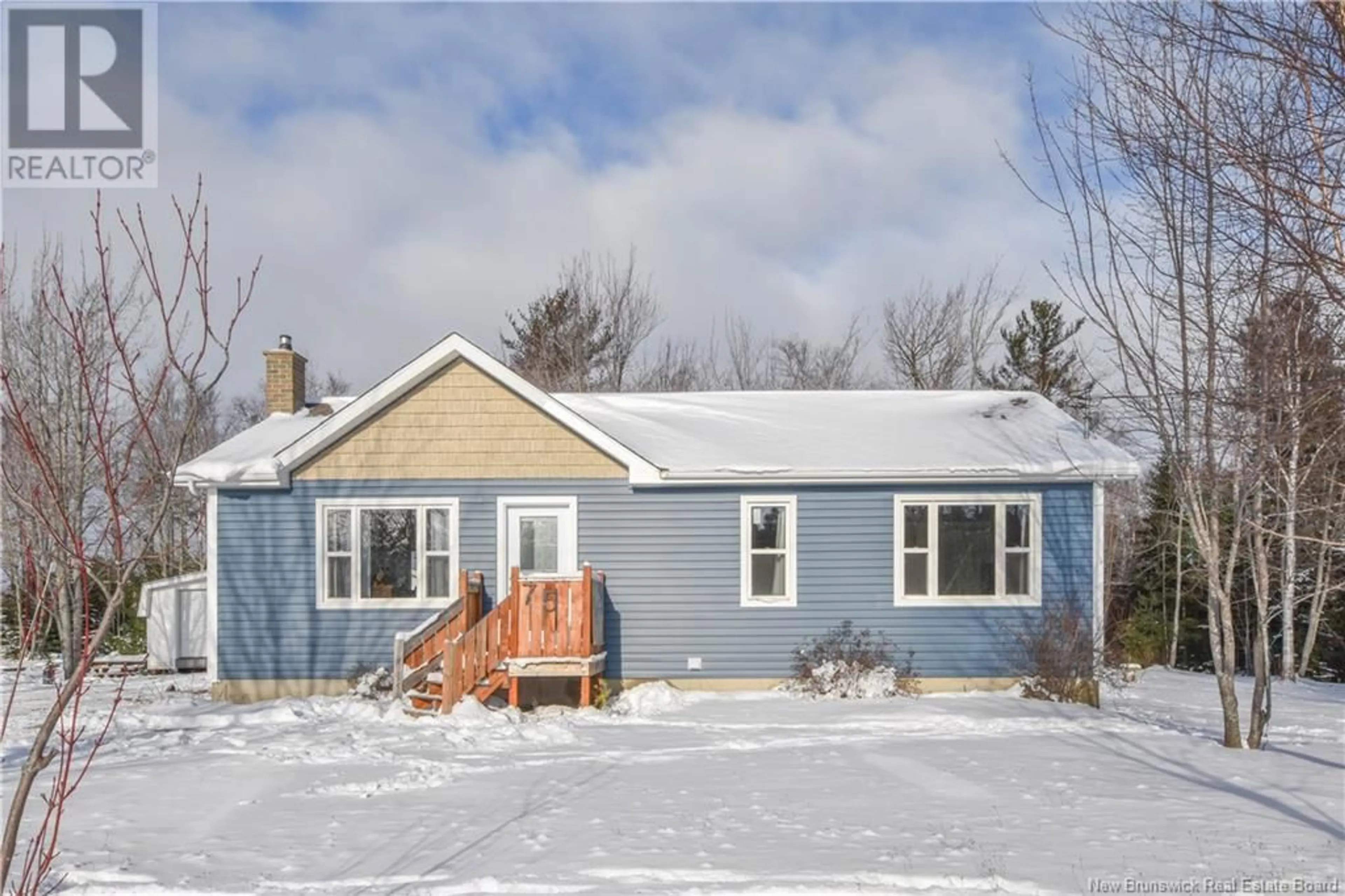 Home with vinyl exterior material, street for 75 rue Bellevue Street, Rivière-À-La-Truite New Brunswick E1X2M2