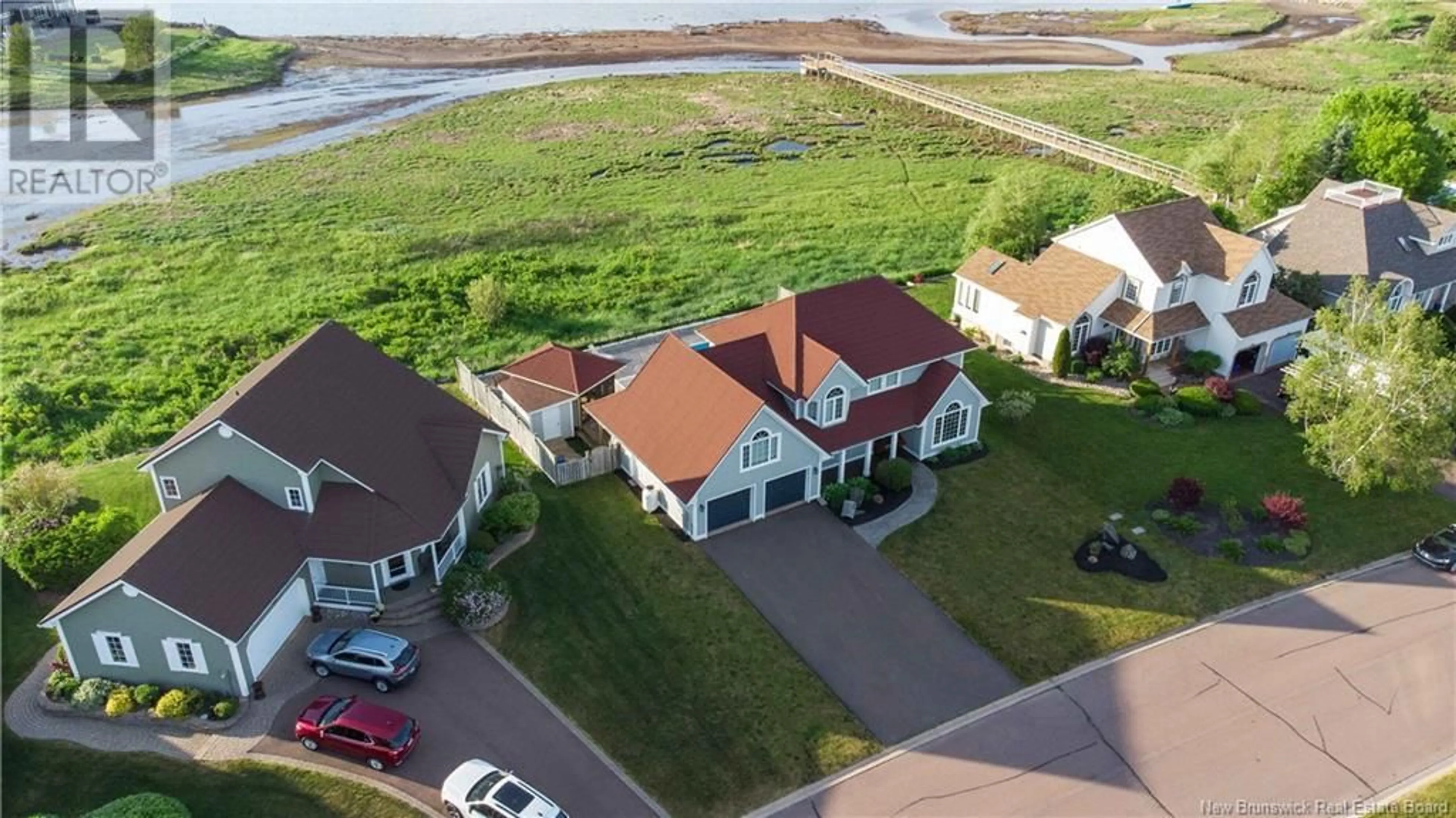 A pic from outside/outdoor area/front of a property/back of a property/a pic from drone, water/lake/river/ocean view for 514 Wayne, Shediac New Brunswick E4P2W9