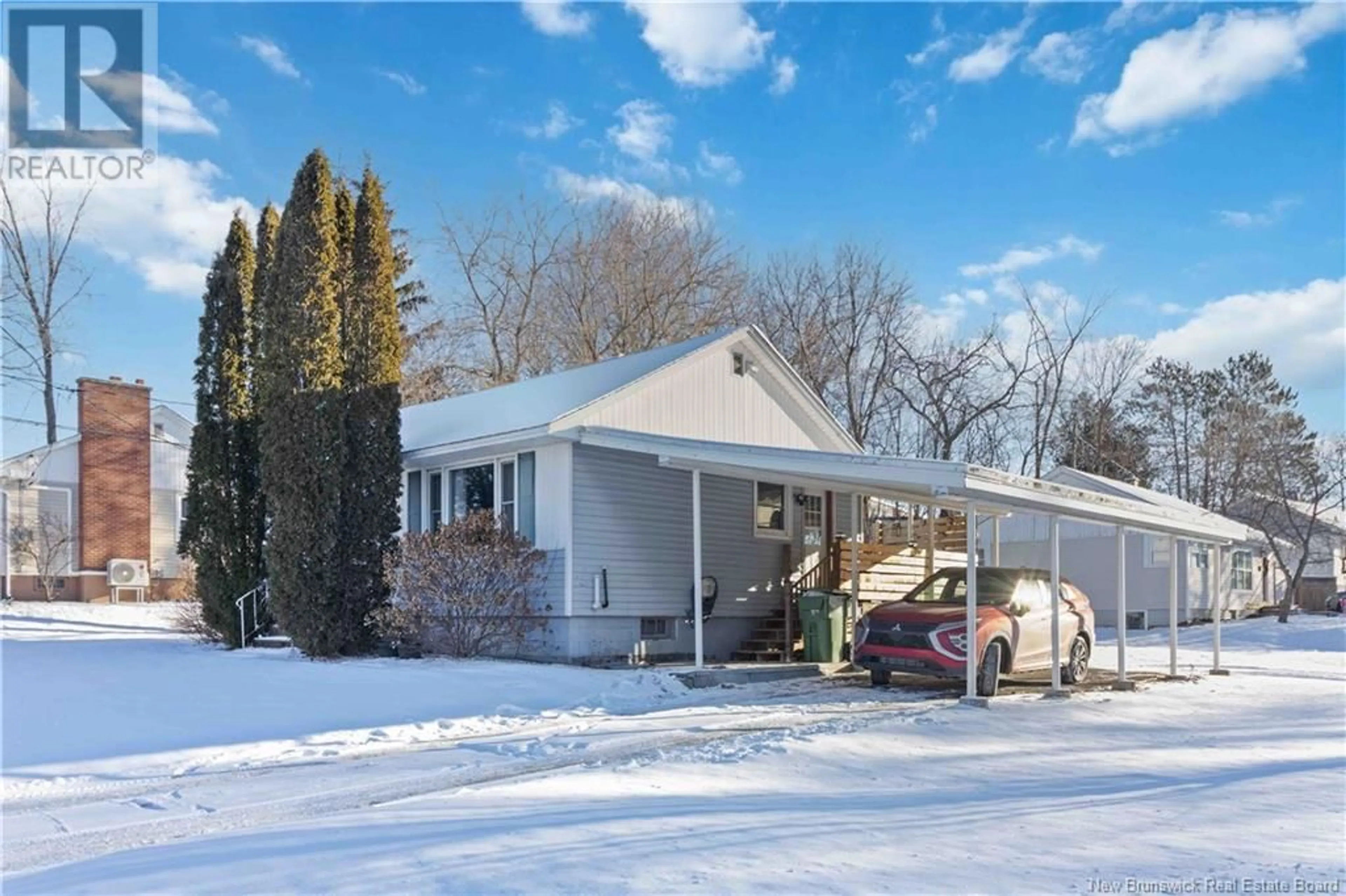 Home with vinyl exterior material, street for 3 Raymond Avenue, Fredericton New Brunswick E3A1S6