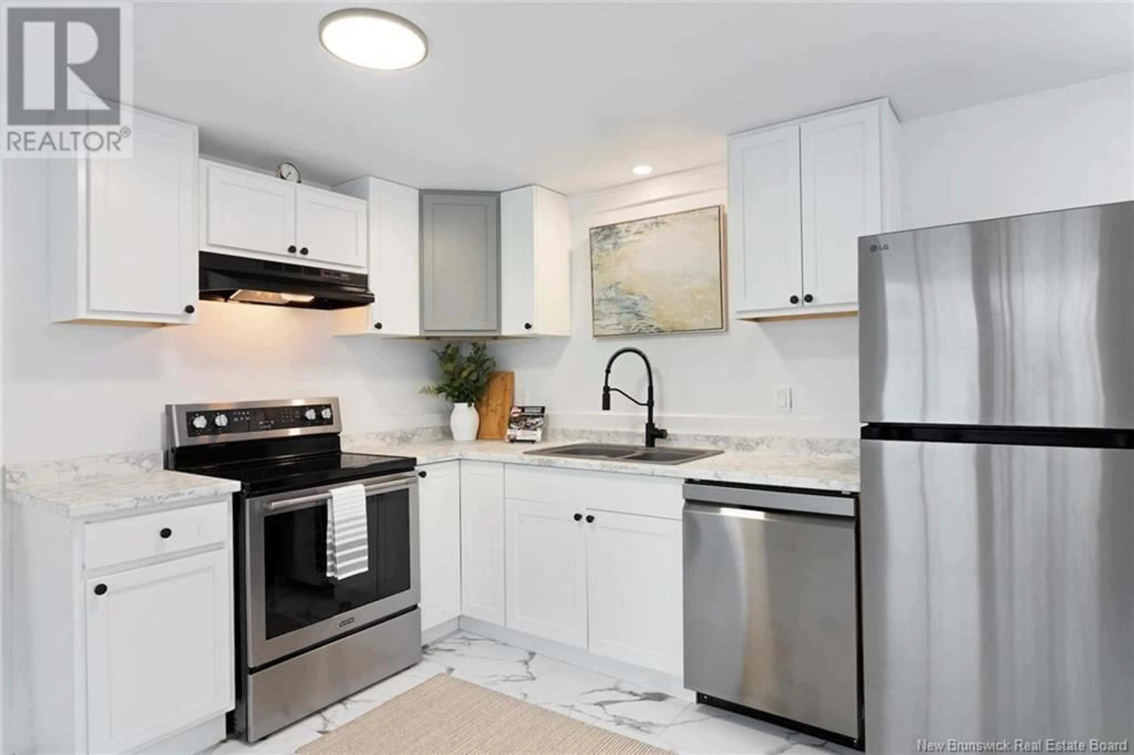 Standard kitchen, ceramic/tile floor for 102 Evergreen Street, Fredericton New Brunswick E3B6N2