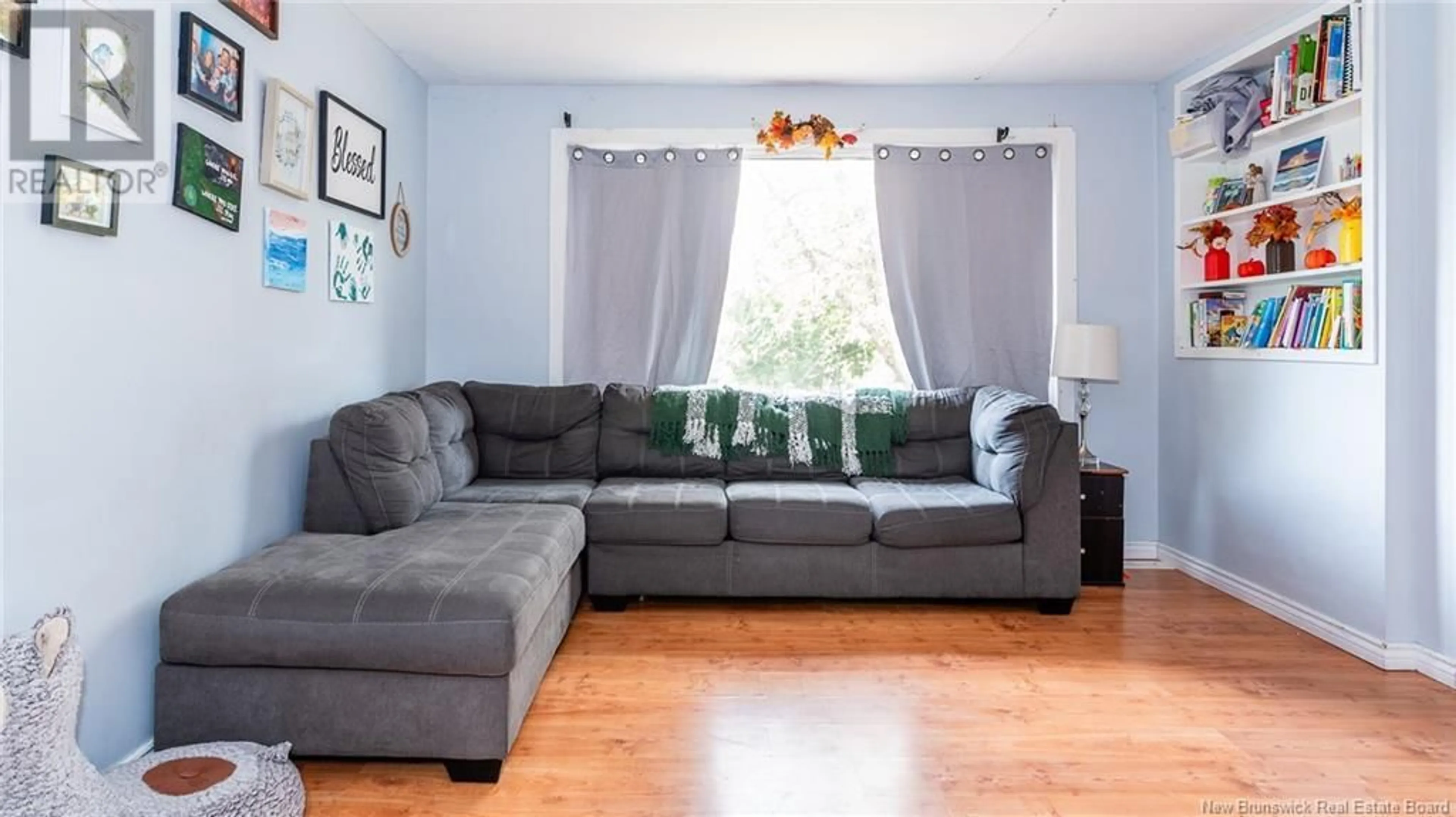 Living room with furniture, wood/laminate floor for 78 Avondale Drive, Riverview New Brunswick E1B1C4