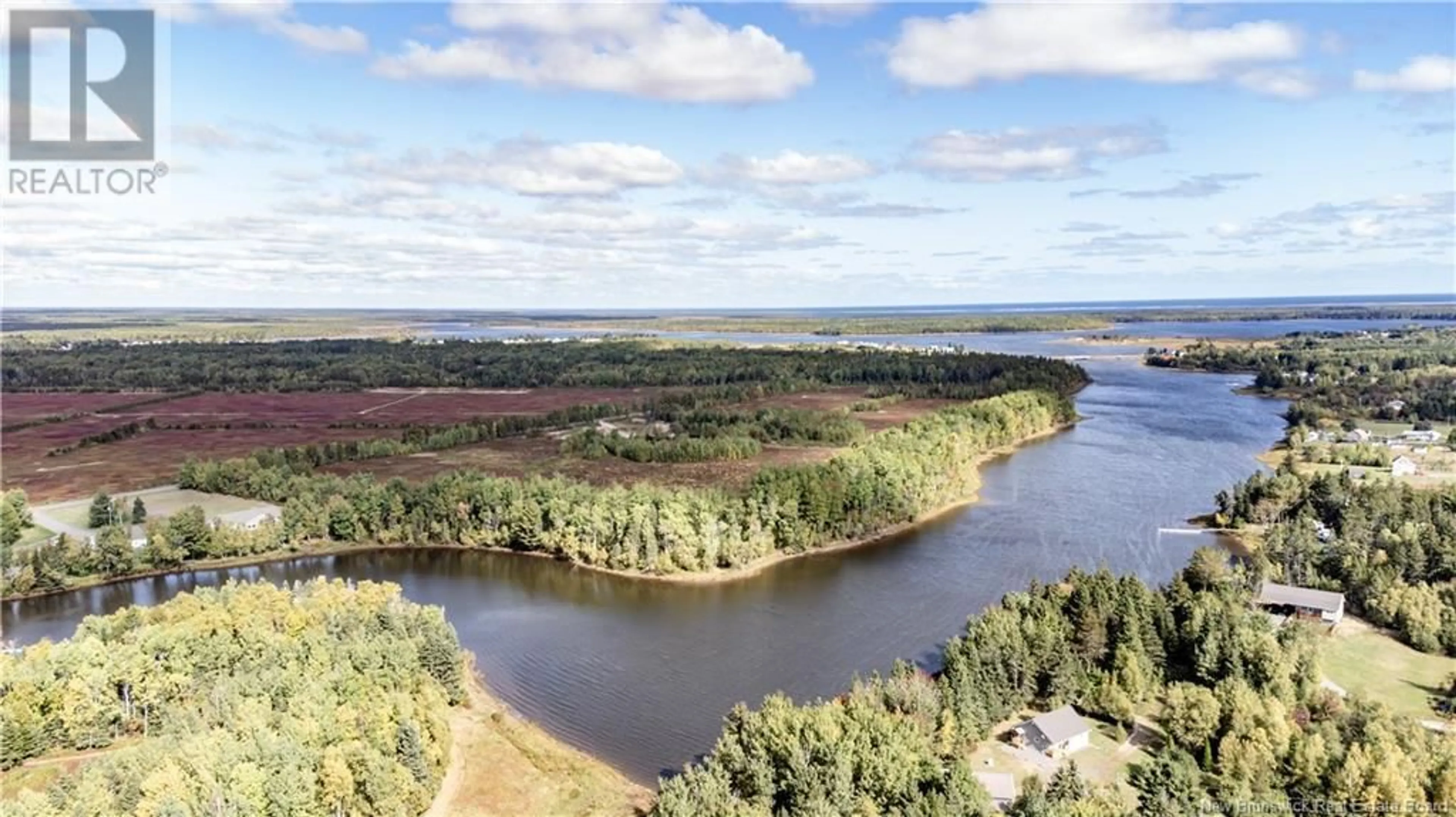 A pic from outside/outdoor area/front of a property/back of a property/a pic from drone, water/lake/river/ocean view for 695 De la Petite Riviere, Aldouane New Brunswick E4W5C1