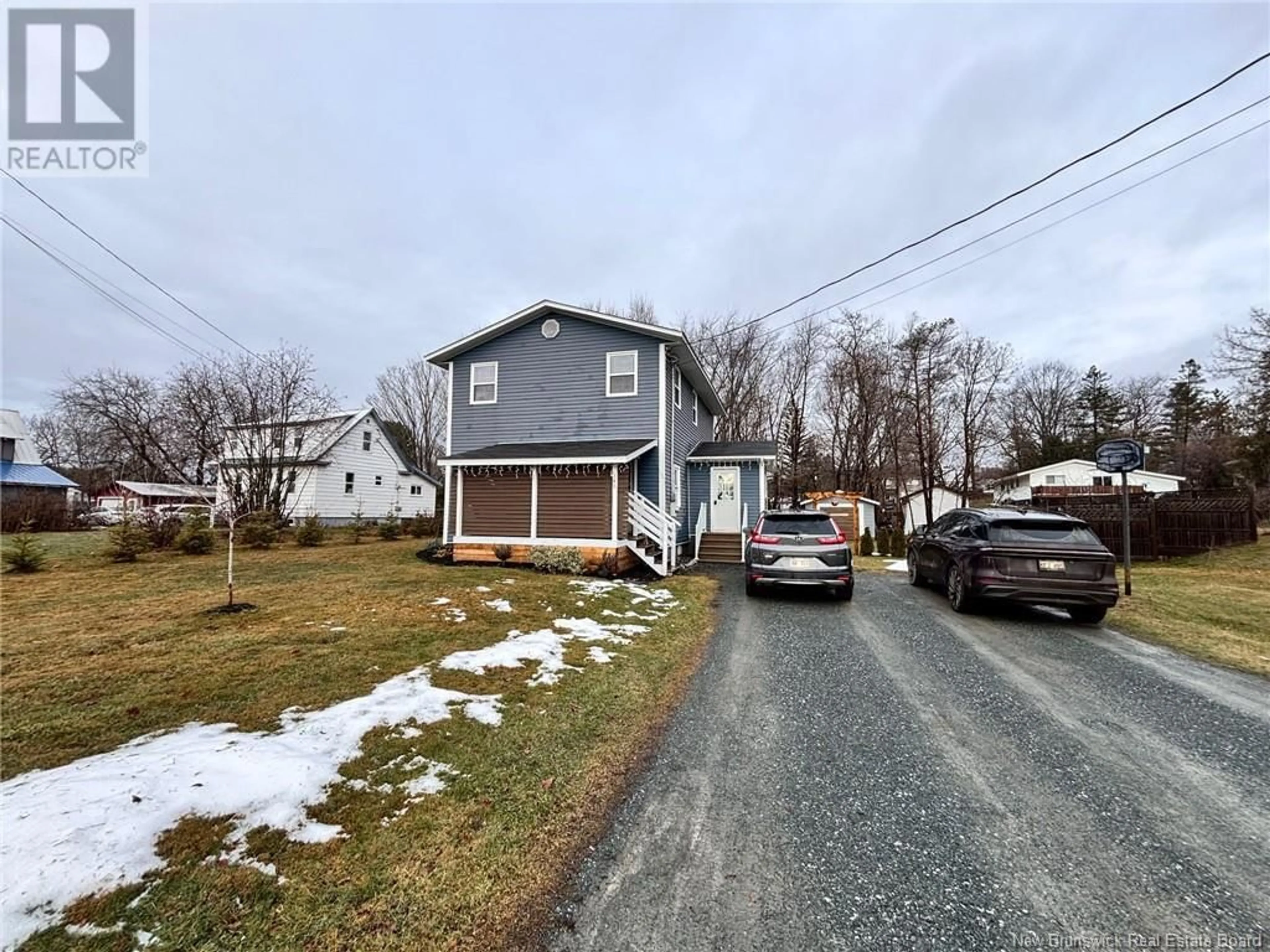 A pic from outside/outdoor area/front of a property/back of a property/a pic from drone, street for 148 Elm Street, Woodstock New Brunswick E7M1R9