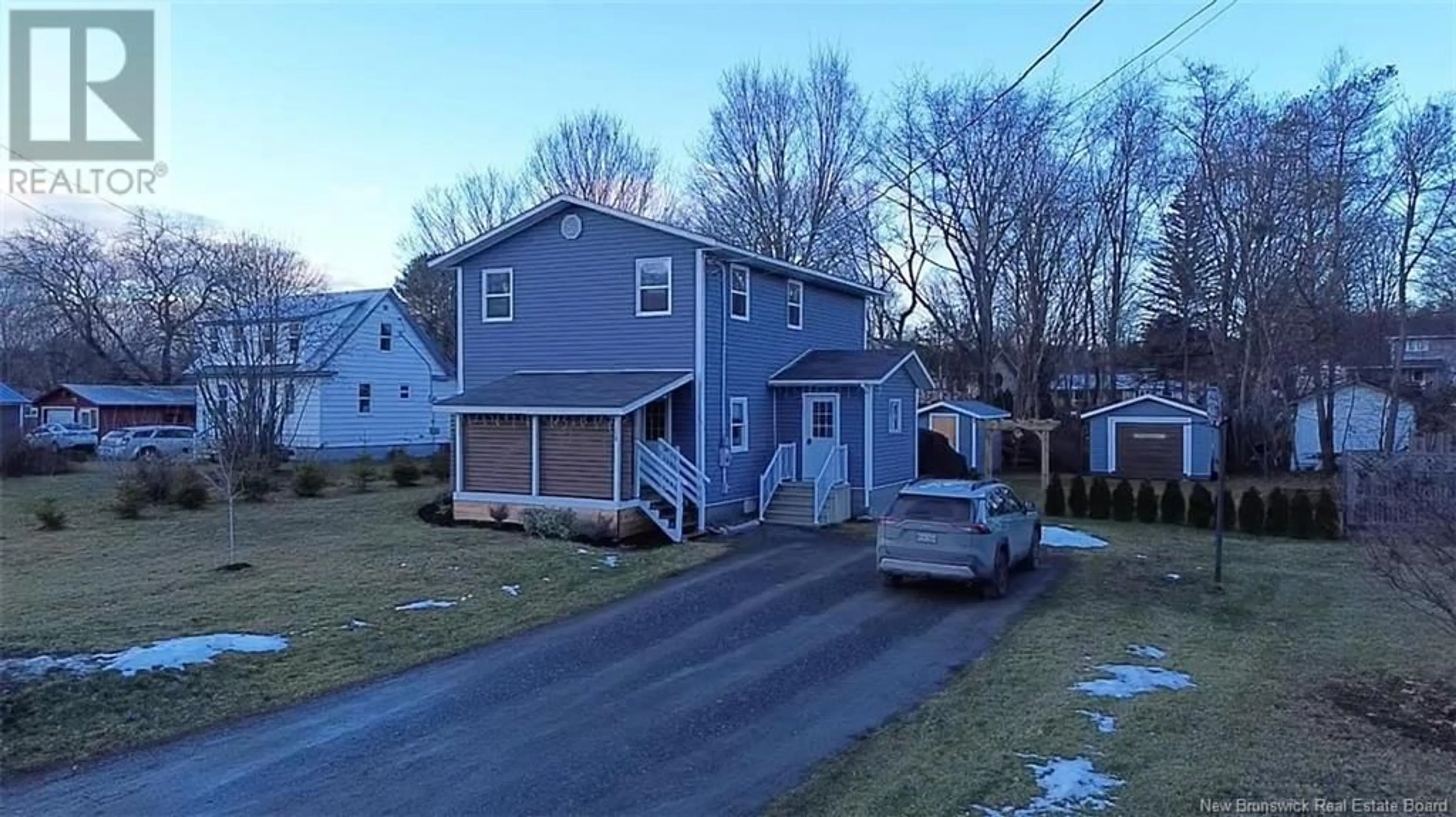 A pic from outside/outdoor area/front of a property/back of a property/a pic from drone, street for 148 Elm Street, Woodstock New Brunswick E7M1R9