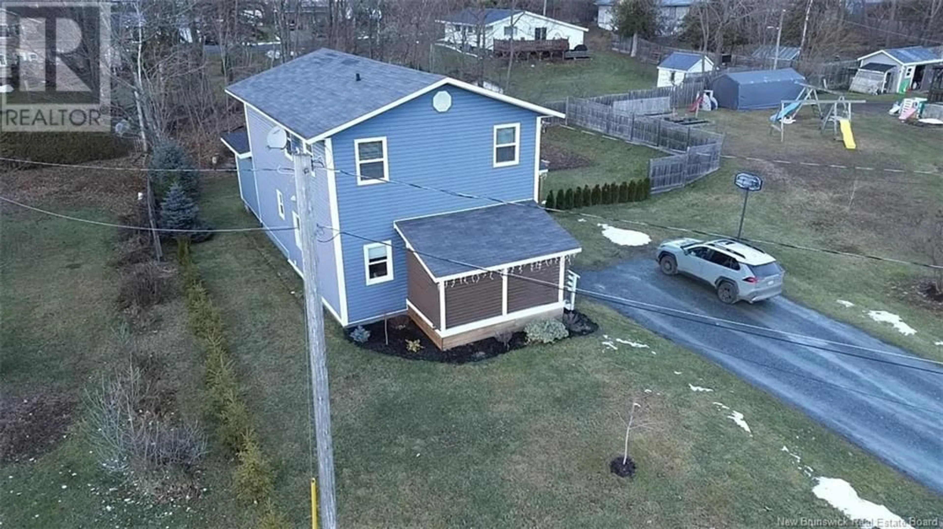 A pic from outside/outdoor area/front of a property/back of a property/a pic from drone, building for 148 Elm Street, Woodstock New Brunswick E7M1R9