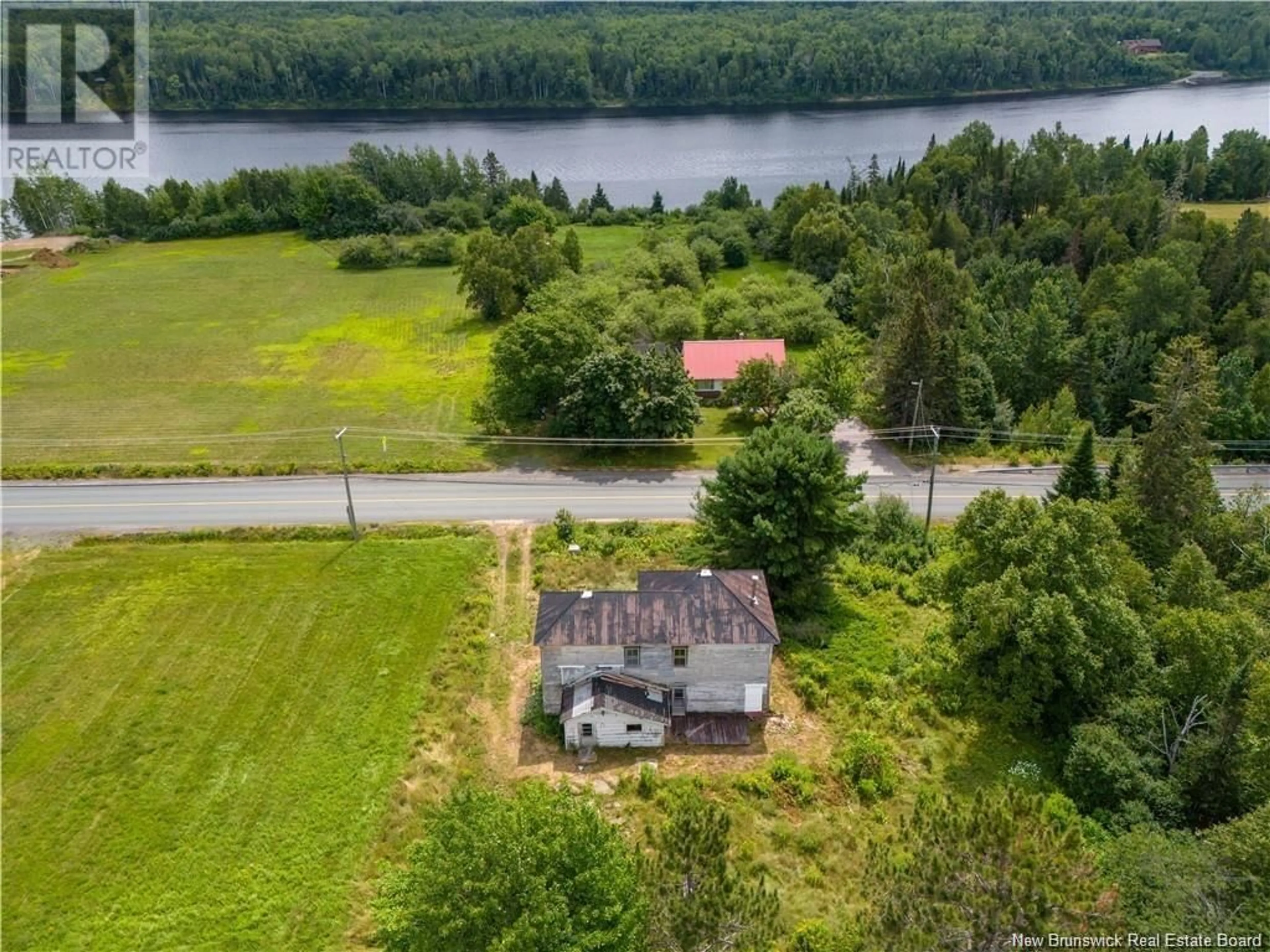 A pic from outside/outdoor area/front of a property/back of a property/a pic from drone, water/lake/river/ocean view for 4697 Route 108 Route, Derby New Brunswick E1V5C3