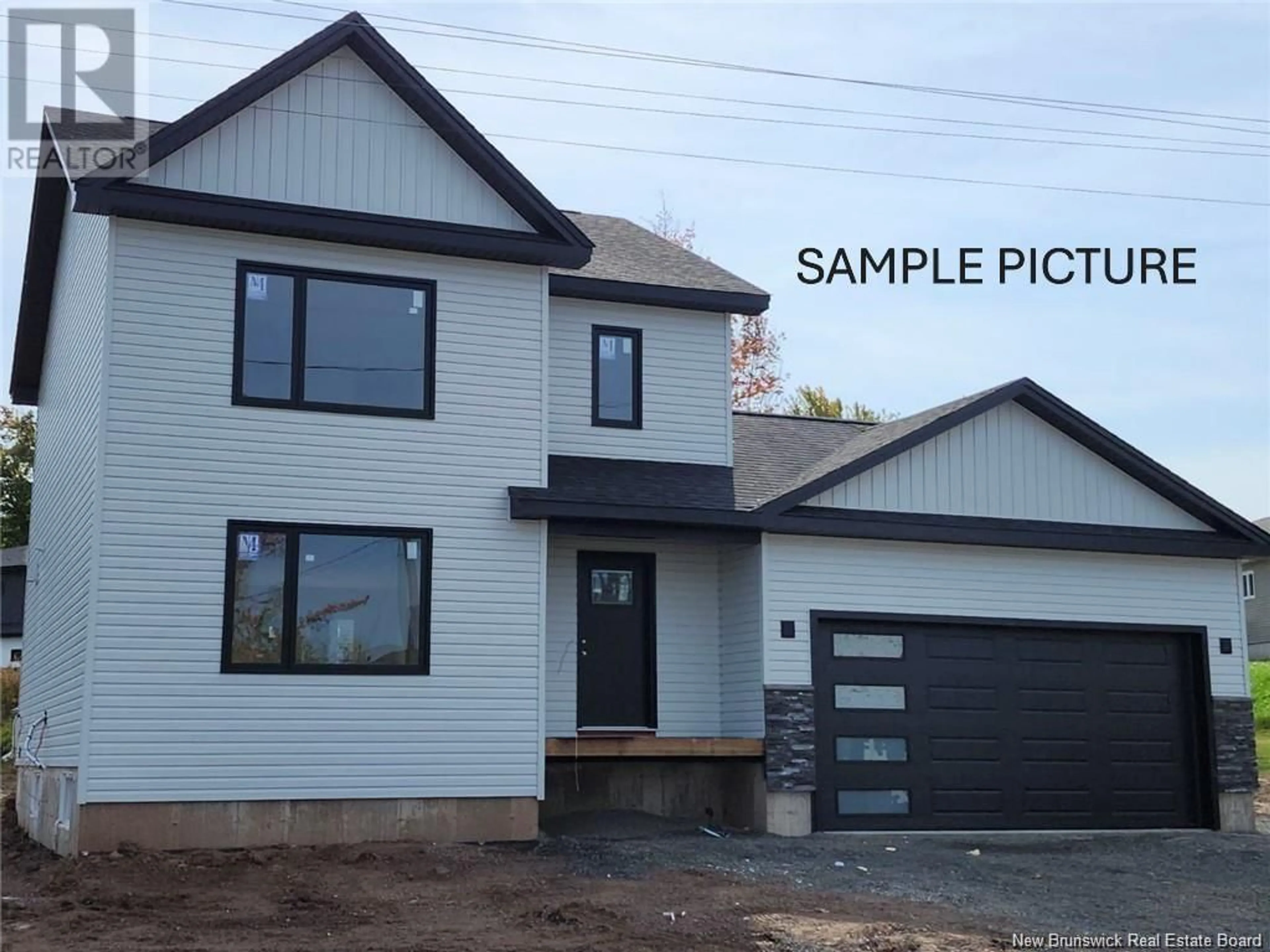 Home with vinyl exterior material, street for 63 Renoir Street, Moncton New Brunswick E1A5V5