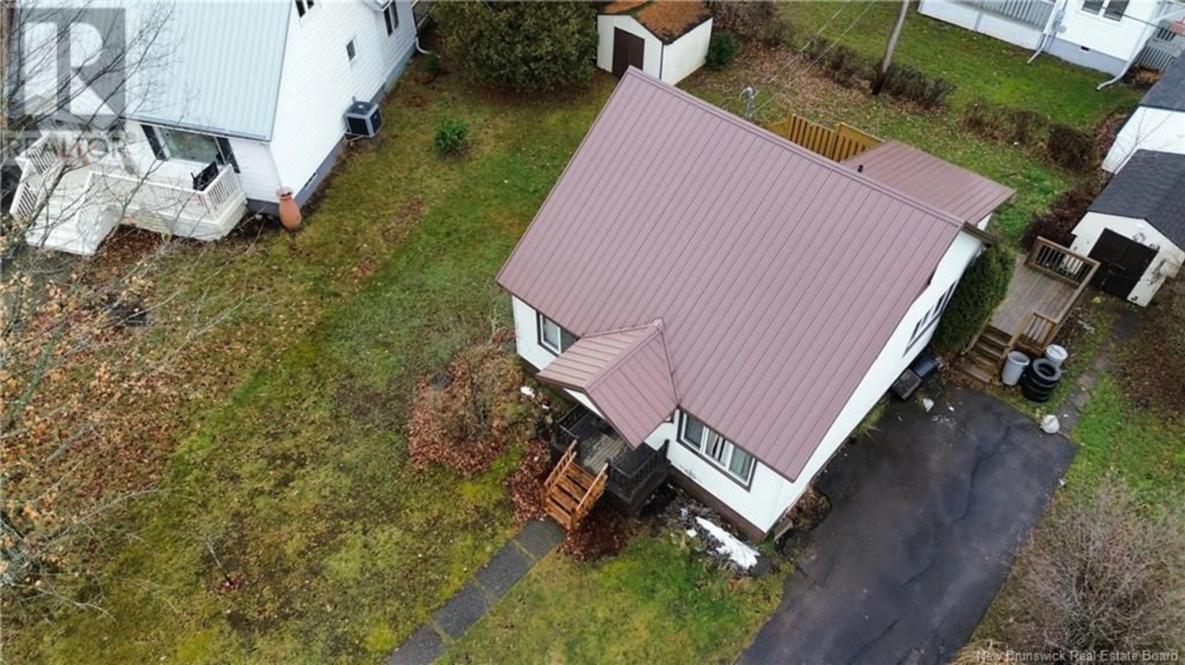 A pic from outside/outdoor area/front of a property/back of a property/a pic from drone, street for 106 Humphrey Street, Moncton New Brunswick E1C6P1