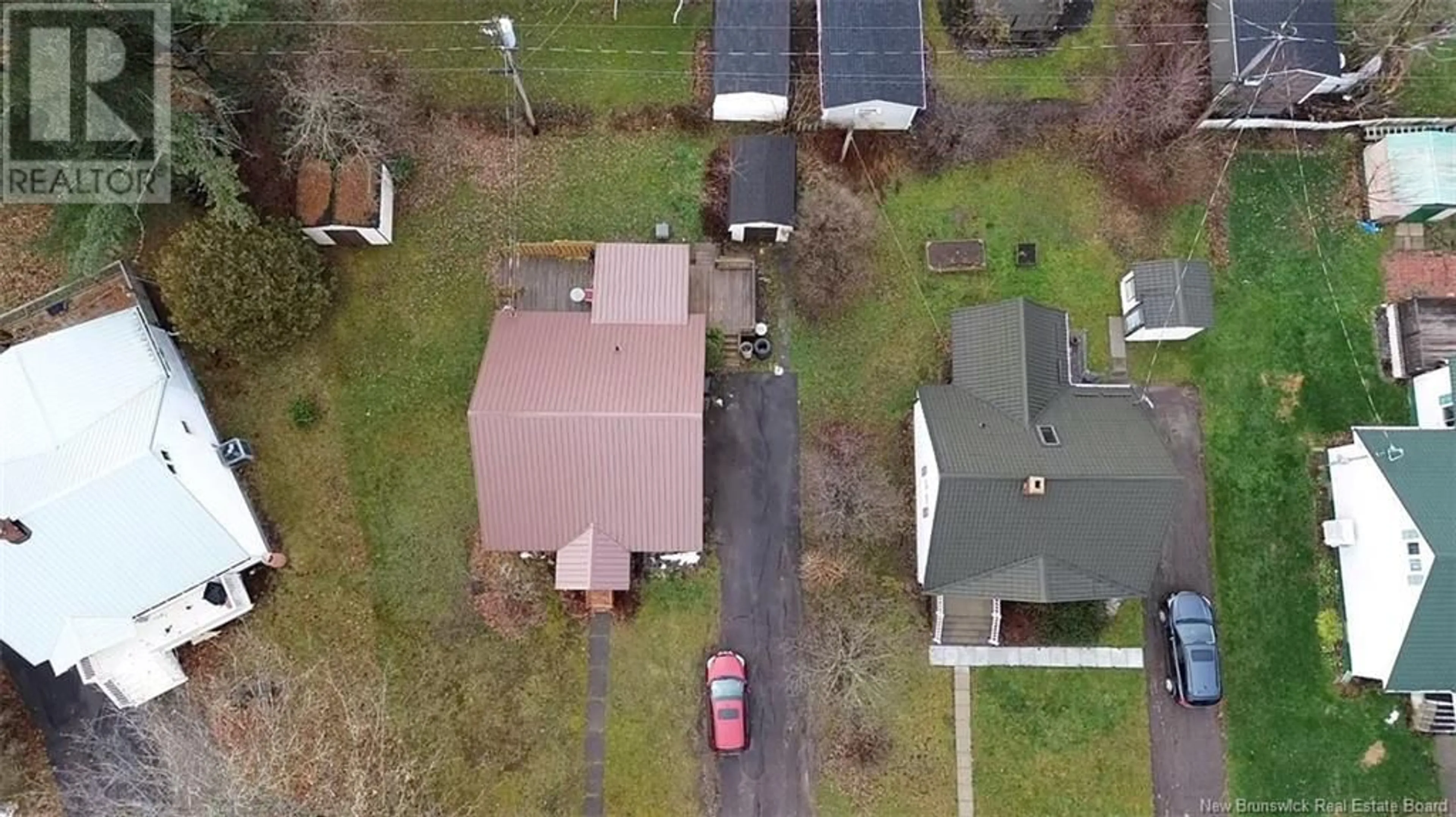 A pic from outside/outdoor area/front of a property/back of a property/a pic from drone, street for 106 Humphrey Street, Moncton New Brunswick E1C6P1