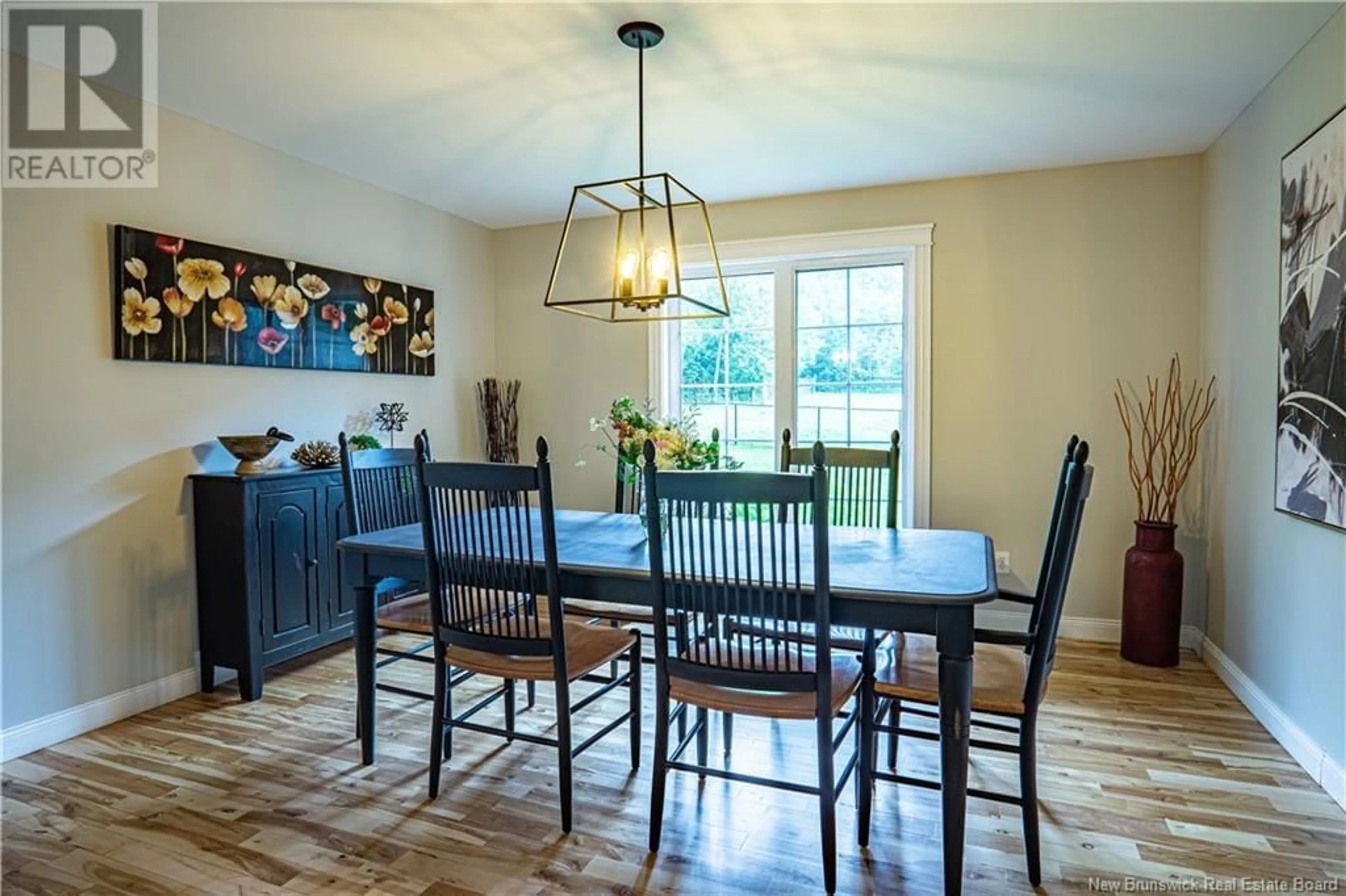 Dining room, wood/laminate floor for 3367 Woodstock Road, Fredericton New Brunswick E3E1A5