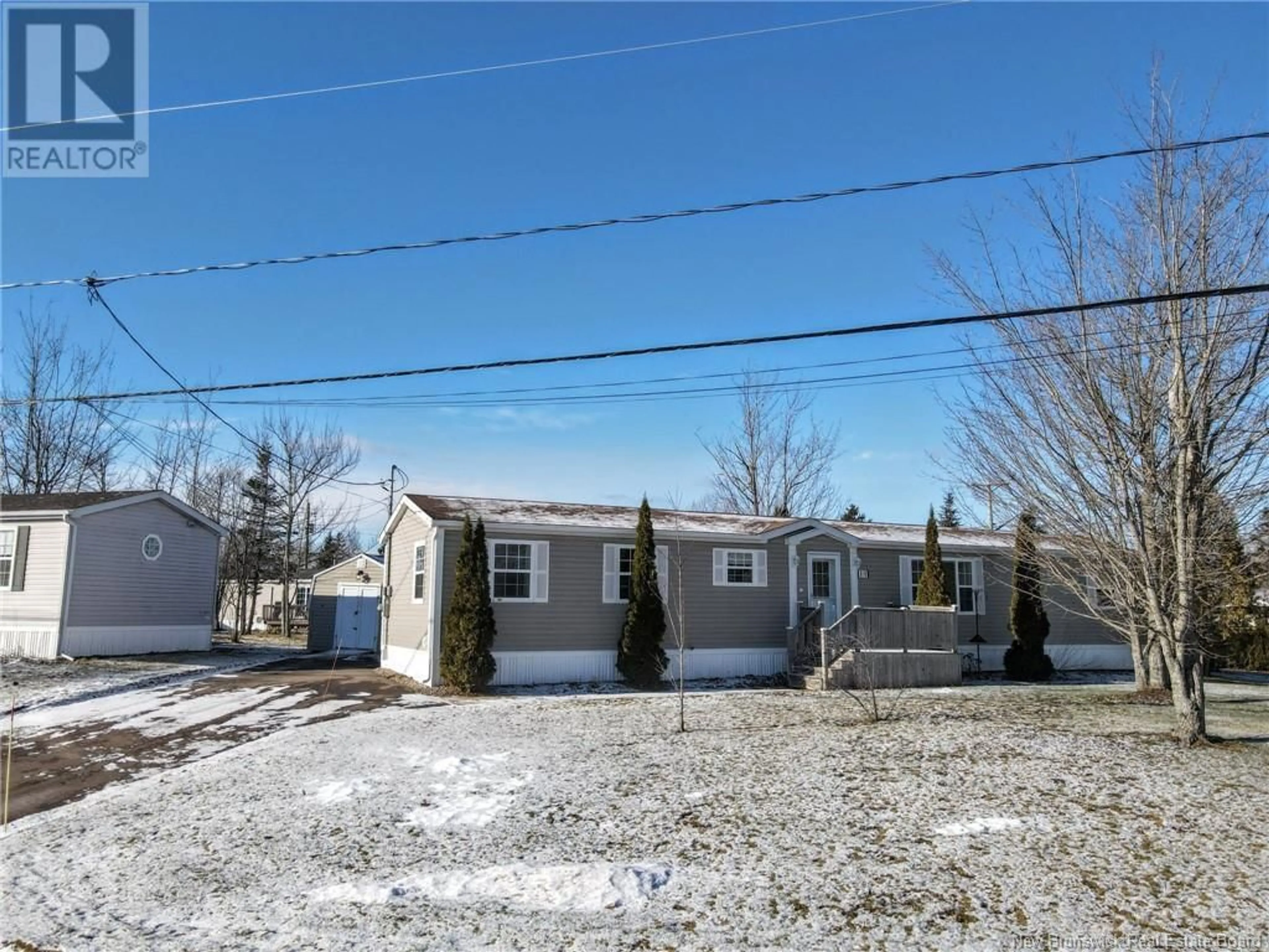 A pic from outside/outdoor area/front of a property/back of a property/a pic from drone, street for 11 Saint Jean Drive, Dieppe New Brunswick E1A7N1