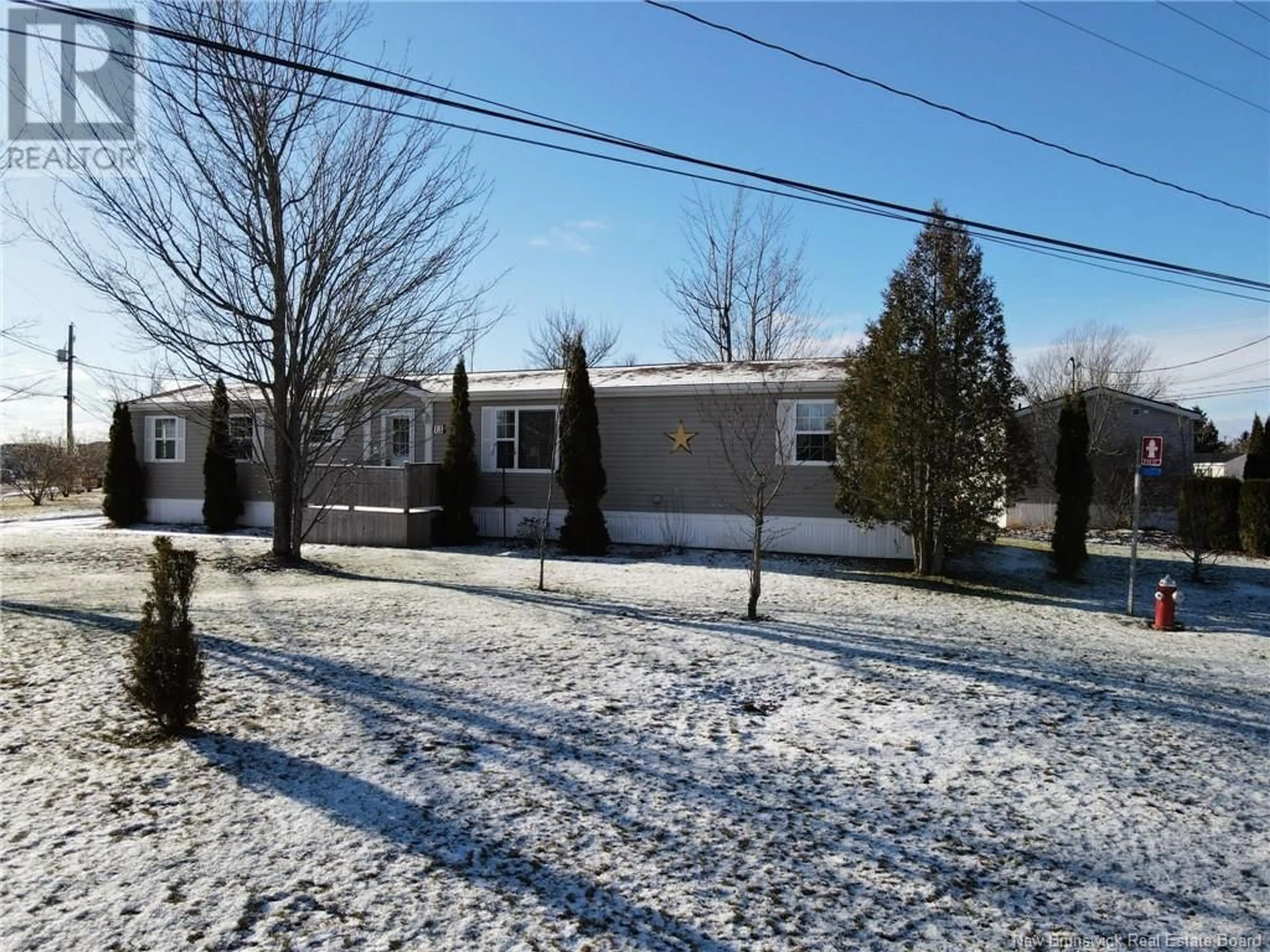 A pic from outside/outdoor area/front of a property/back of a property/a pic from drone, street for 11 Saint Jean Drive, Dieppe New Brunswick E1A7N1