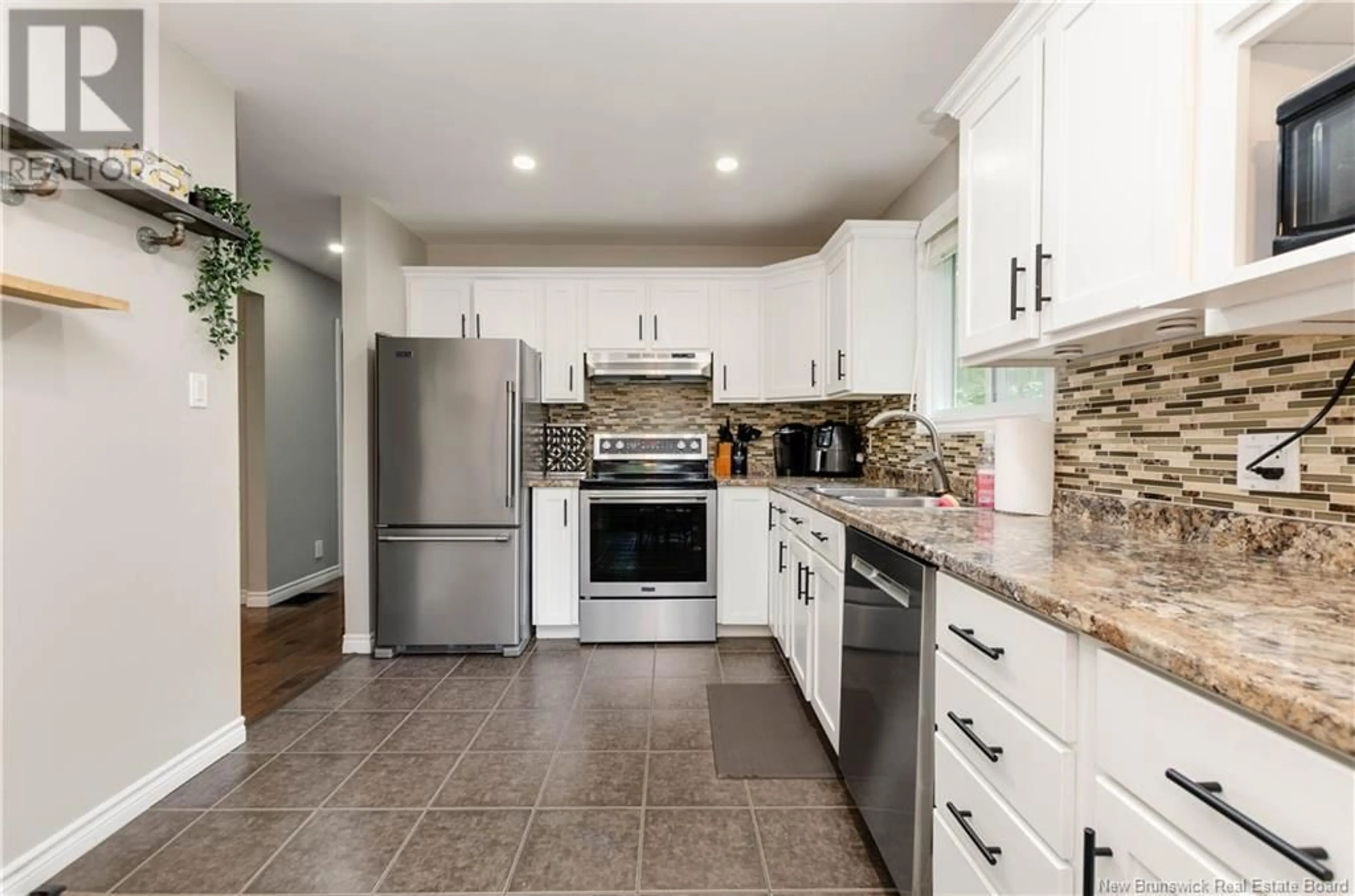 Open concept kitchen, ceramic/tile floor for 207 Lower Mountain Road, Boundary Creek New Brunswick E1G4E6