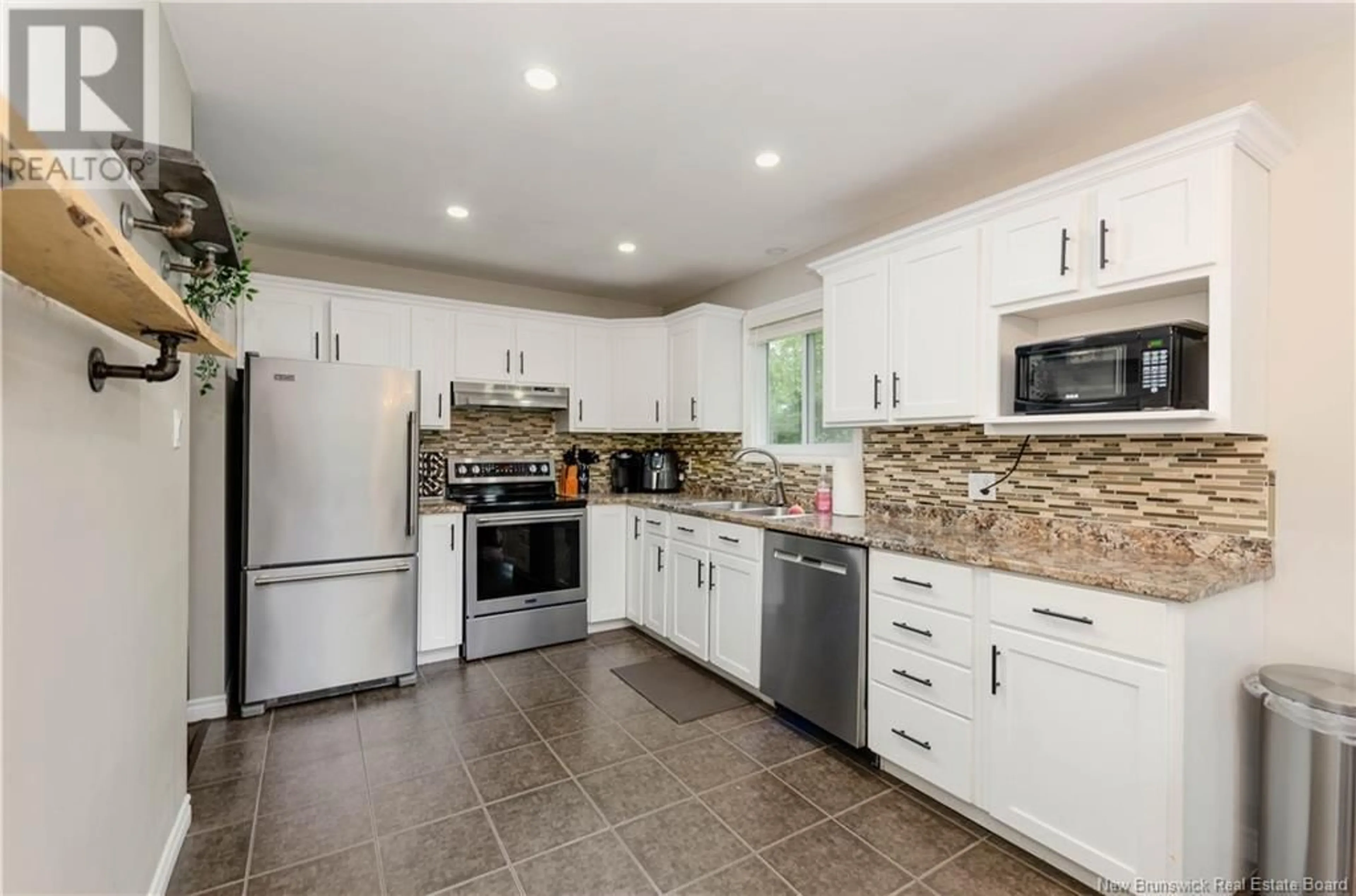 Open concept kitchen, ceramic/tile floor for 207 Lower Mountain Road, Boundary Creek New Brunswick E1G4E6