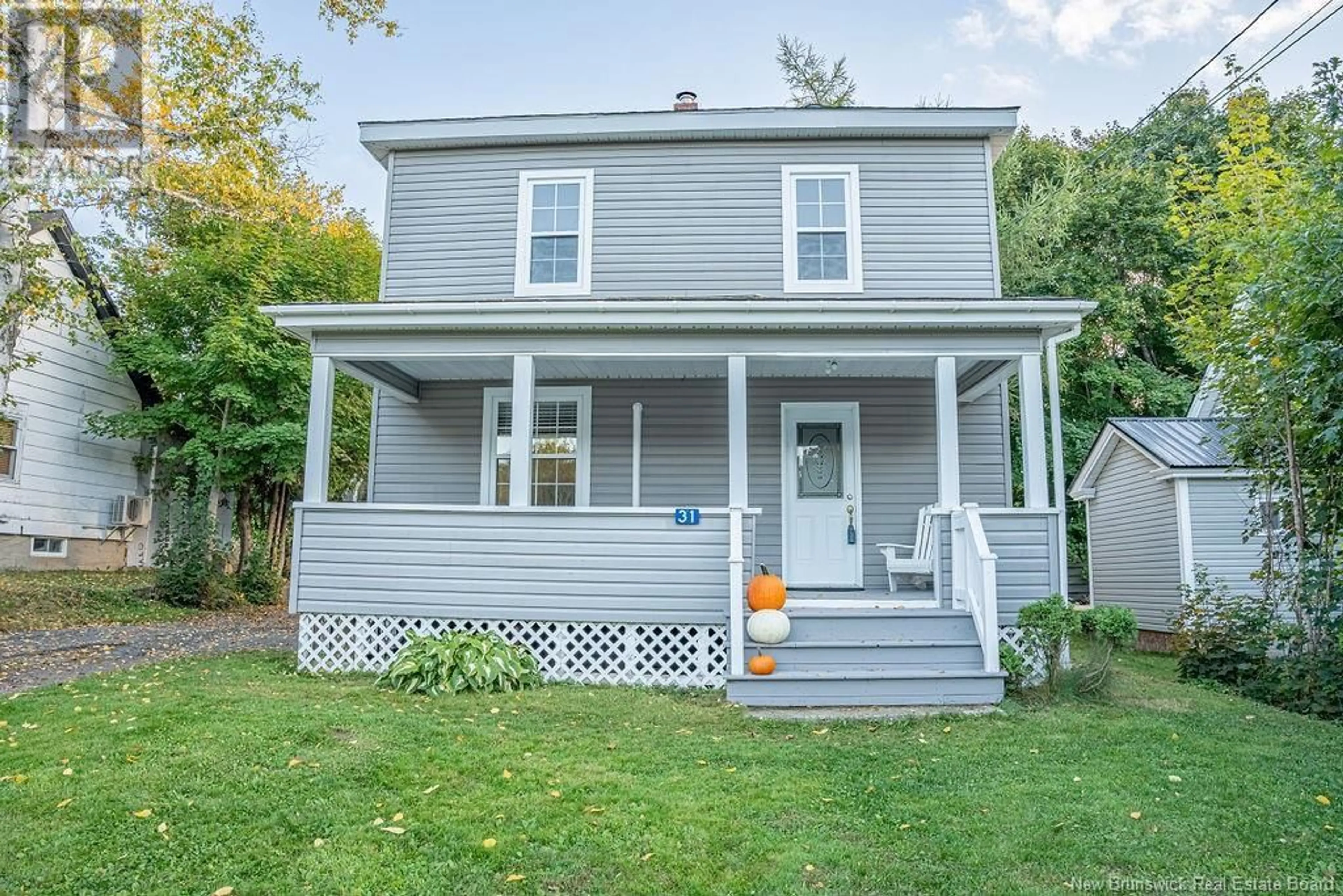 Home with vinyl exterior material, street for 31 Oak Street, McAdam New Brunswick E6J1M5