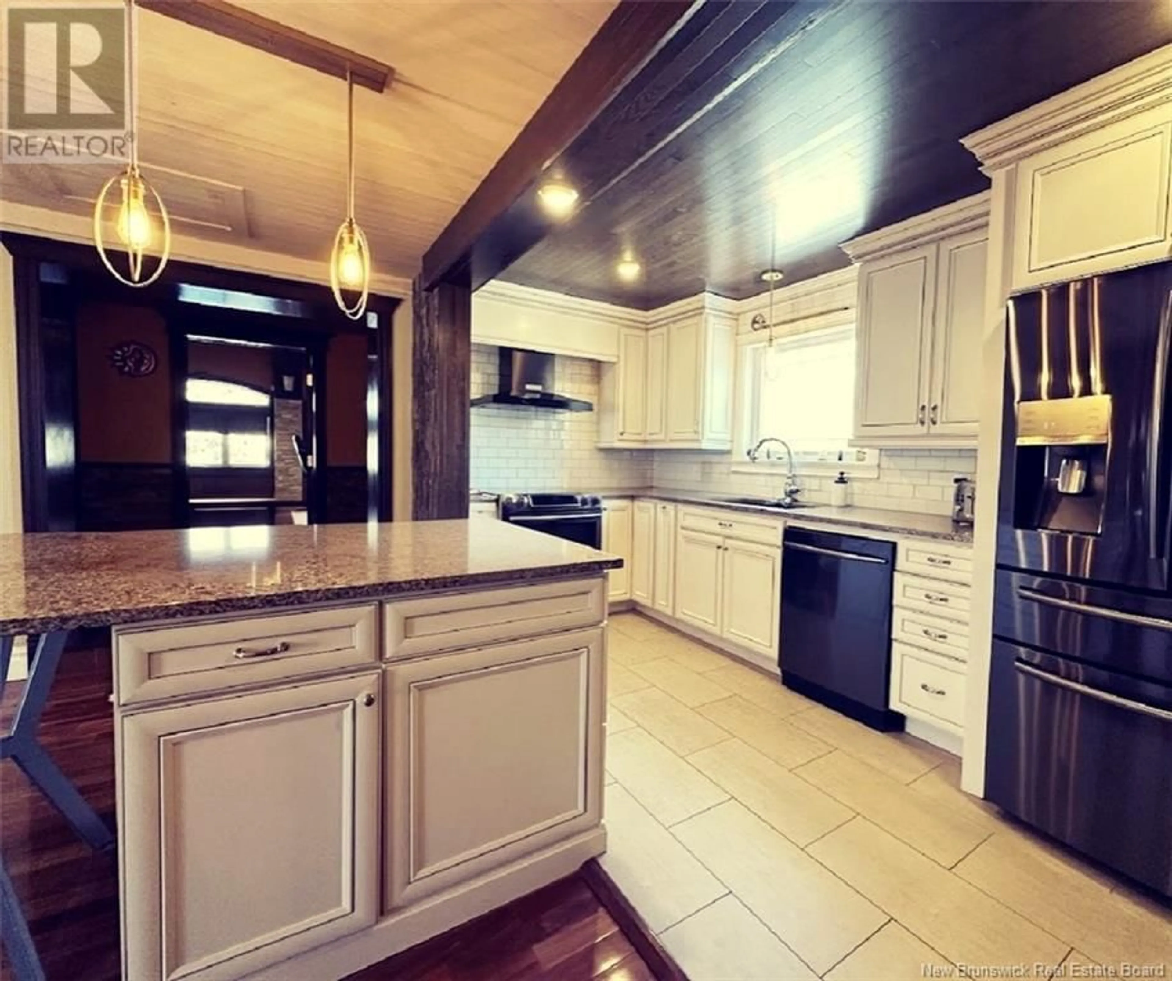 Open concept kitchen, ceramic/tile floor for 1374 St-Francois Street, Edmundston New Brunswick E3V4P3