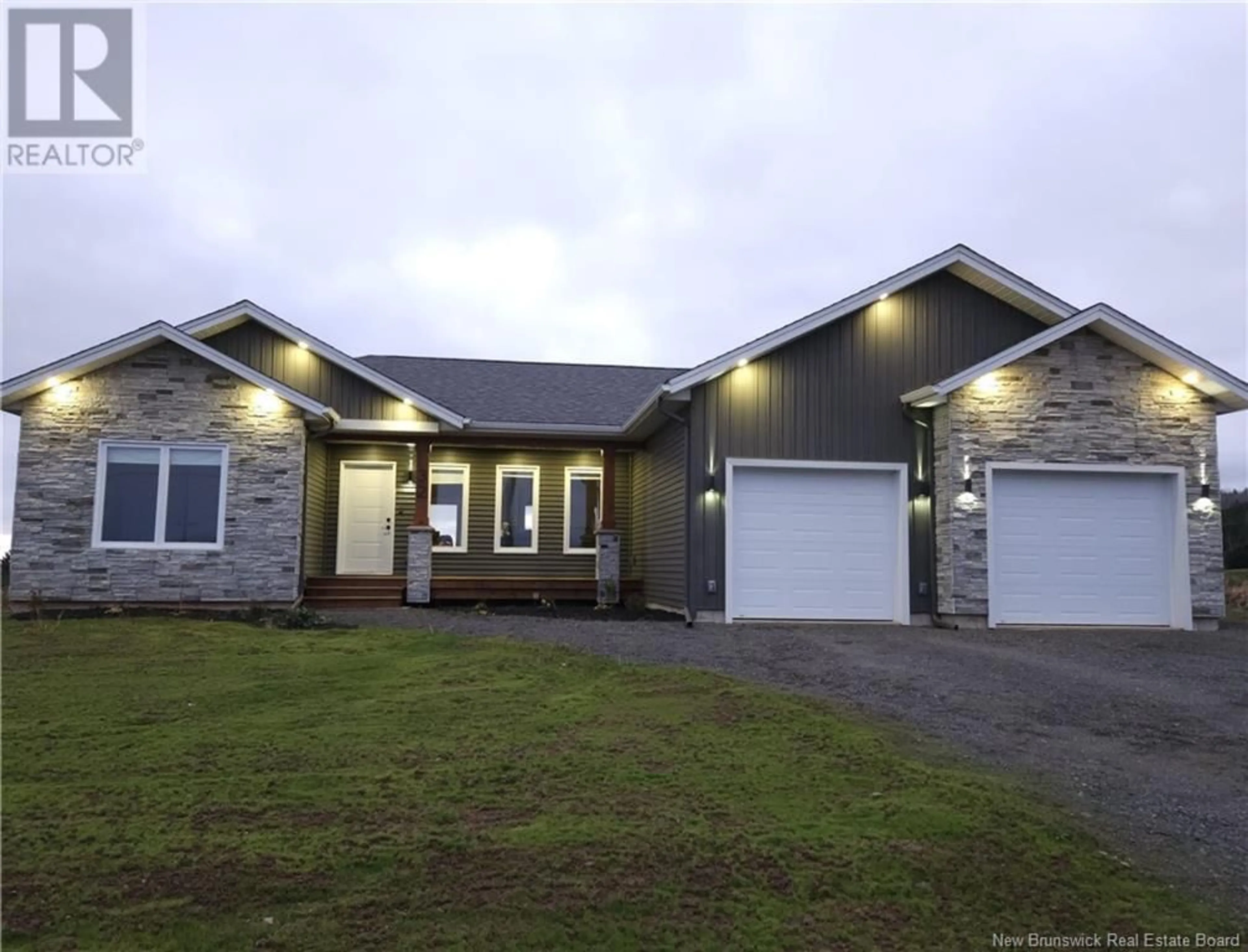 Home with vinyl exterior material, street for 32 Briar Rose Drive, Ammon New Brunswick E1G0Y8