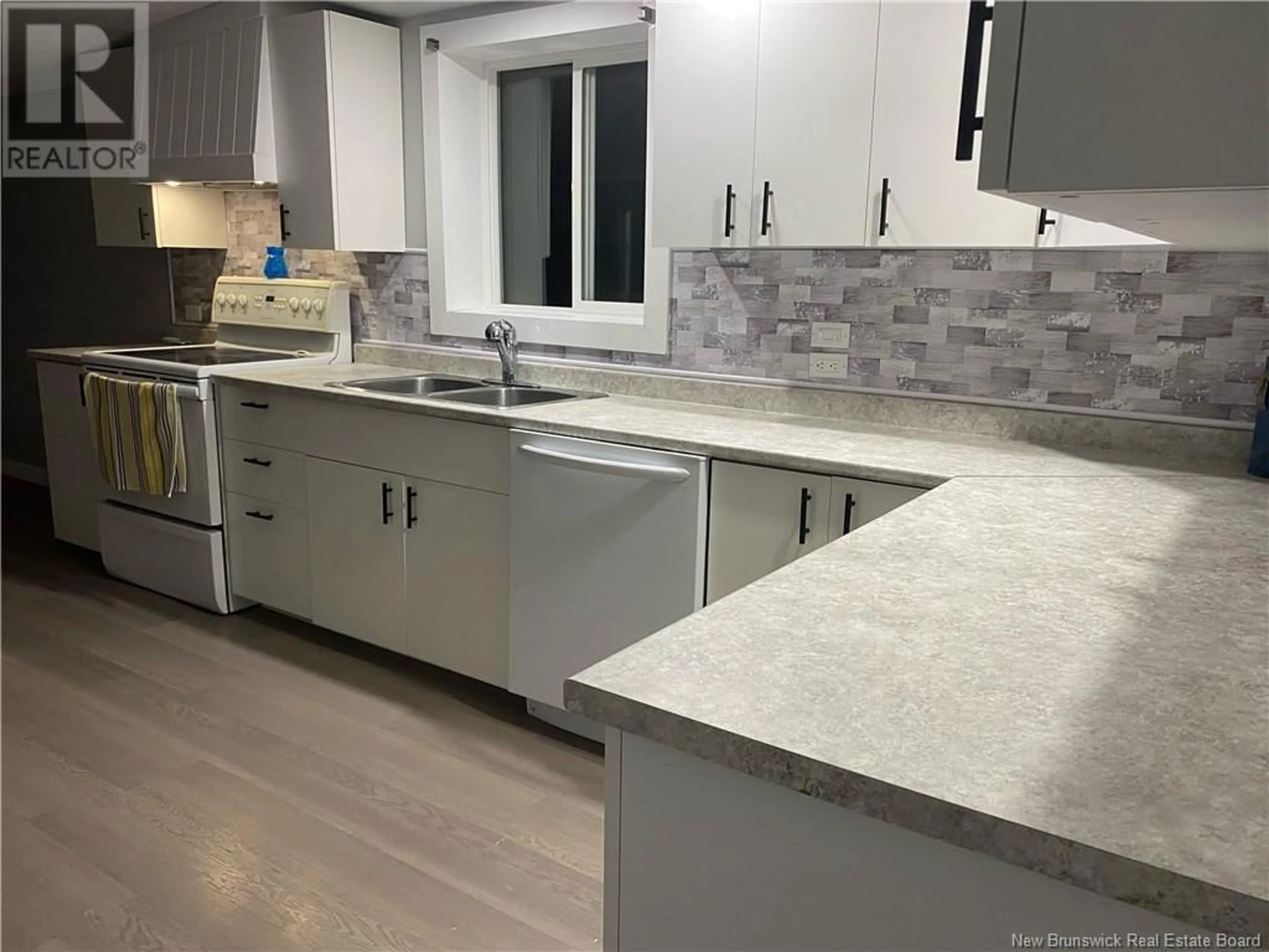 Open concept kitchen, ceramic/tile floor for 144 ST CHARLES, Saint-Charles New Brunswick E4W5L5