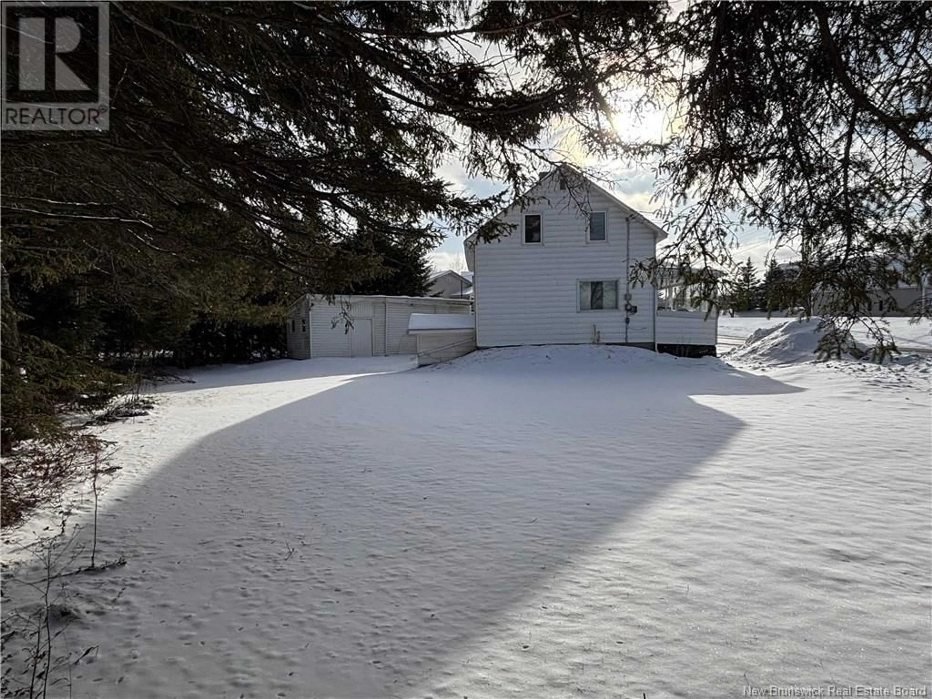 A pic from outside/outdoor area/front of a property/back of a property/a pic from drone, street for 51 Portage Road, Grand Falls New Brunswick E3Z2Y6