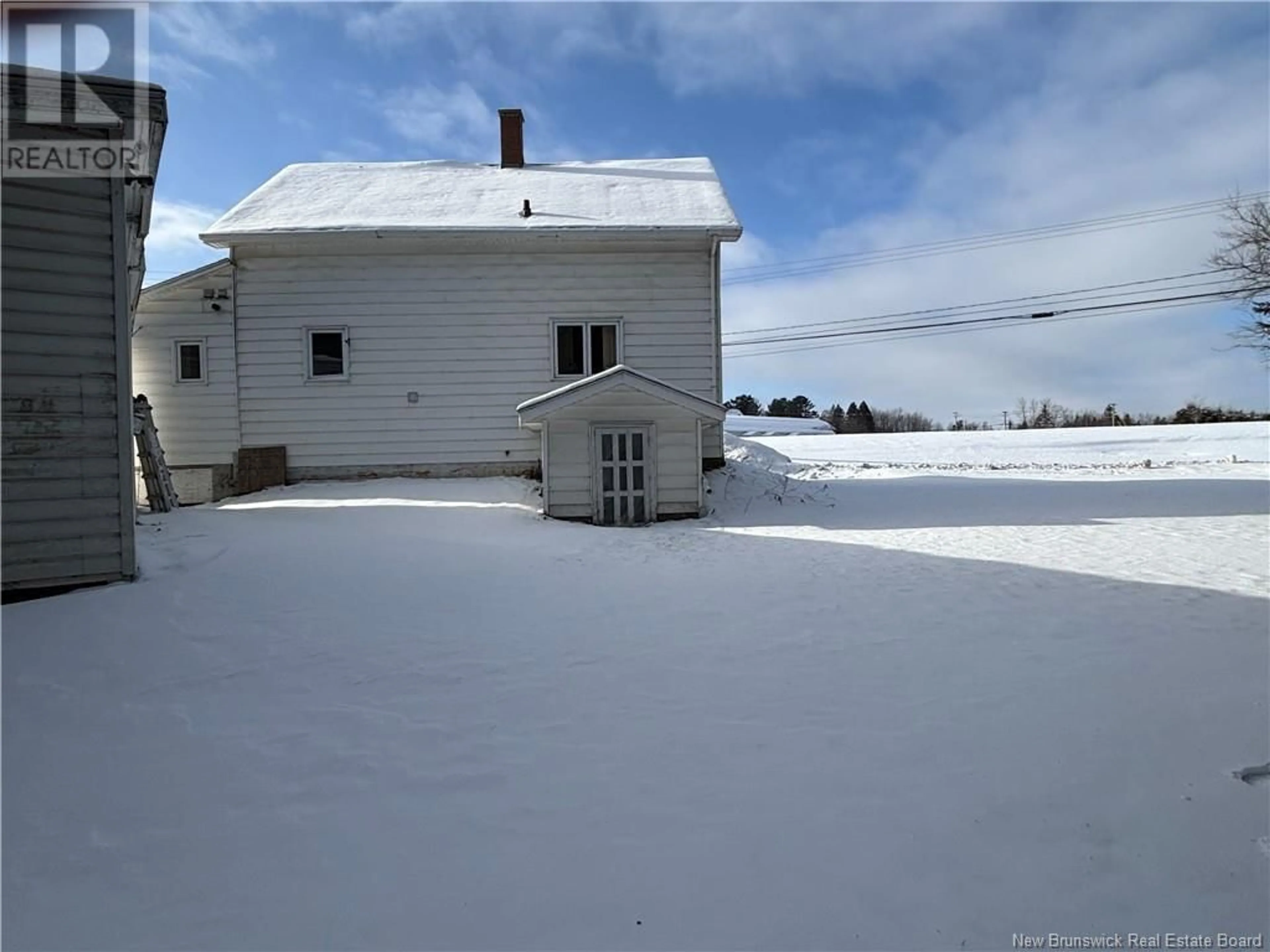 A pic from outside/outdoor area/front of a property/back of a property/a pic from drone, street for 51 Portage Road, Grand Falls New Brunswick E3Z2Y6