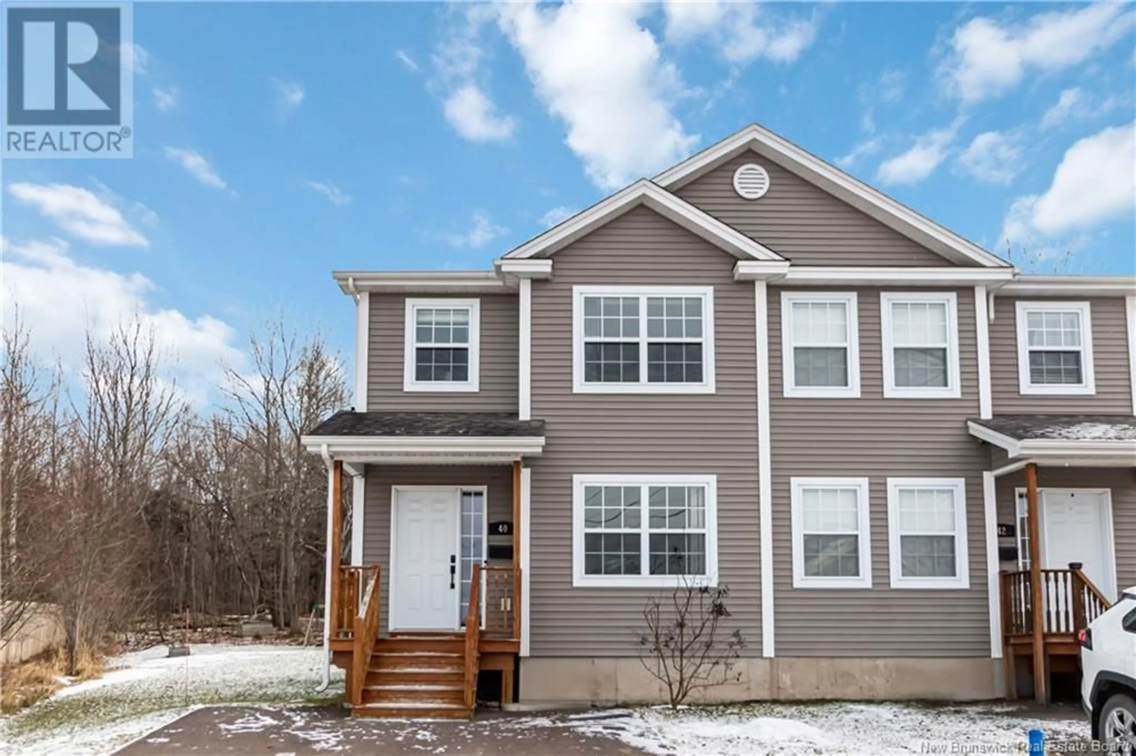 Home with vinyl exterior material, street for 40 Sapins Court, Dieppe New Brunswick E1A8X6