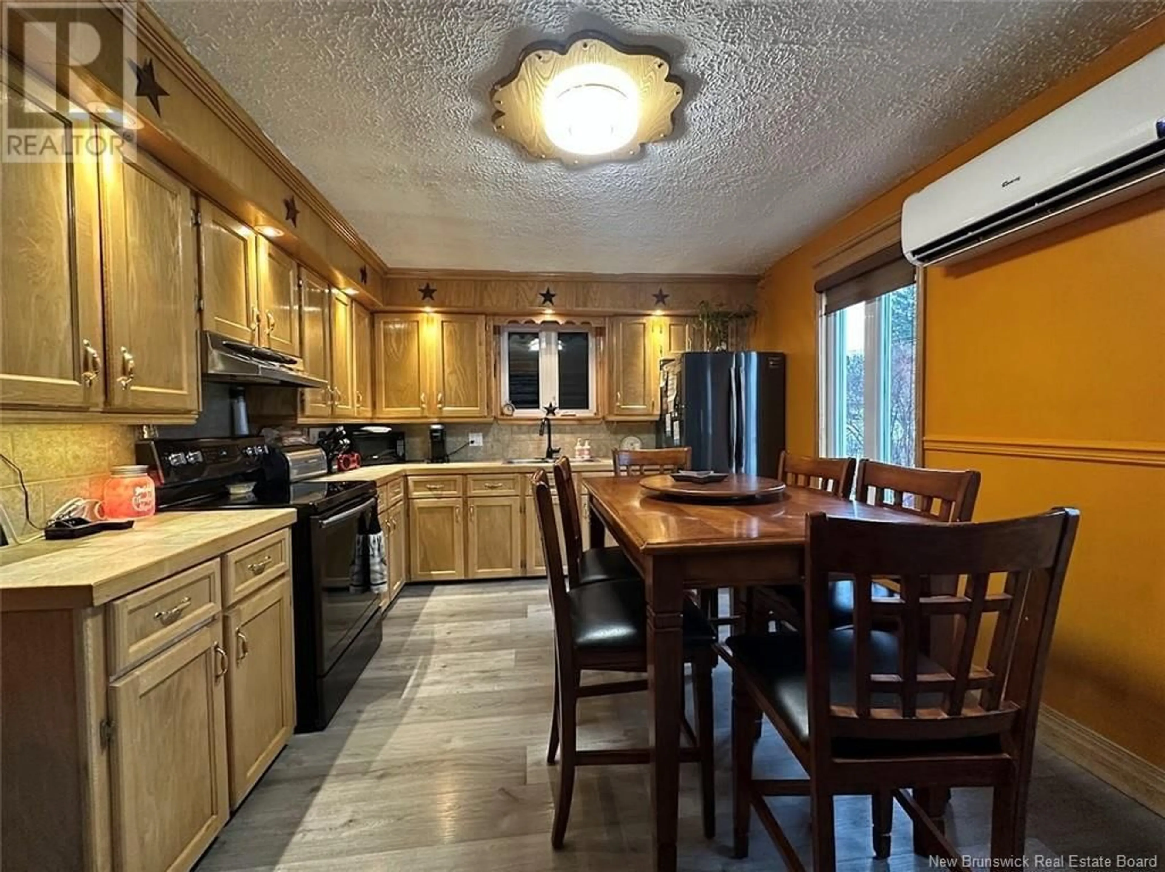 Open concept kitchen, unknown for 3 Theriault Street, Rivière-Verte New Brunswick E7C2W6