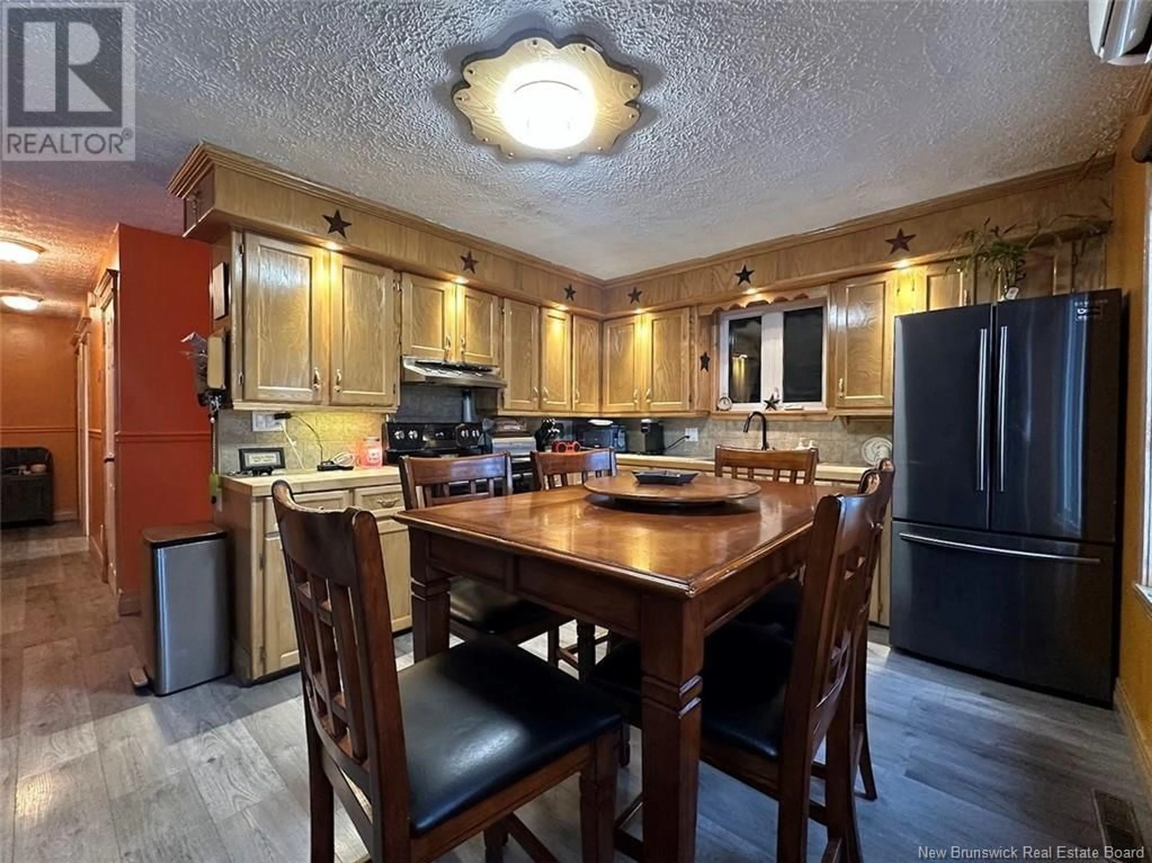 Open concept kitchen, unknown for 3 Theriault Street, Rivière-Verte New Brunswick E7C2W6