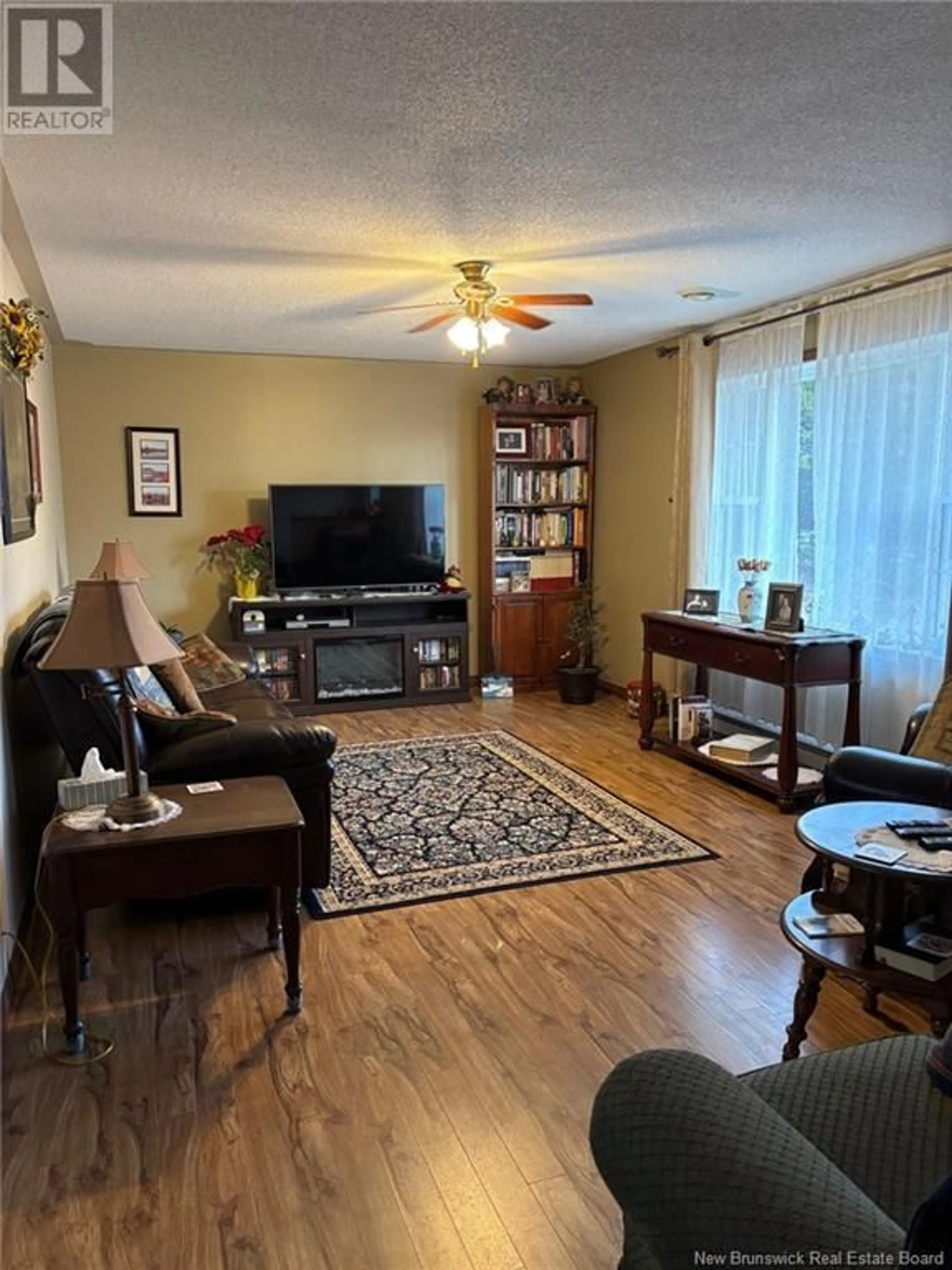 Living room with furniture, unknown for 19 McKnight Road, Moores Mills New Brunswick E3L4V4