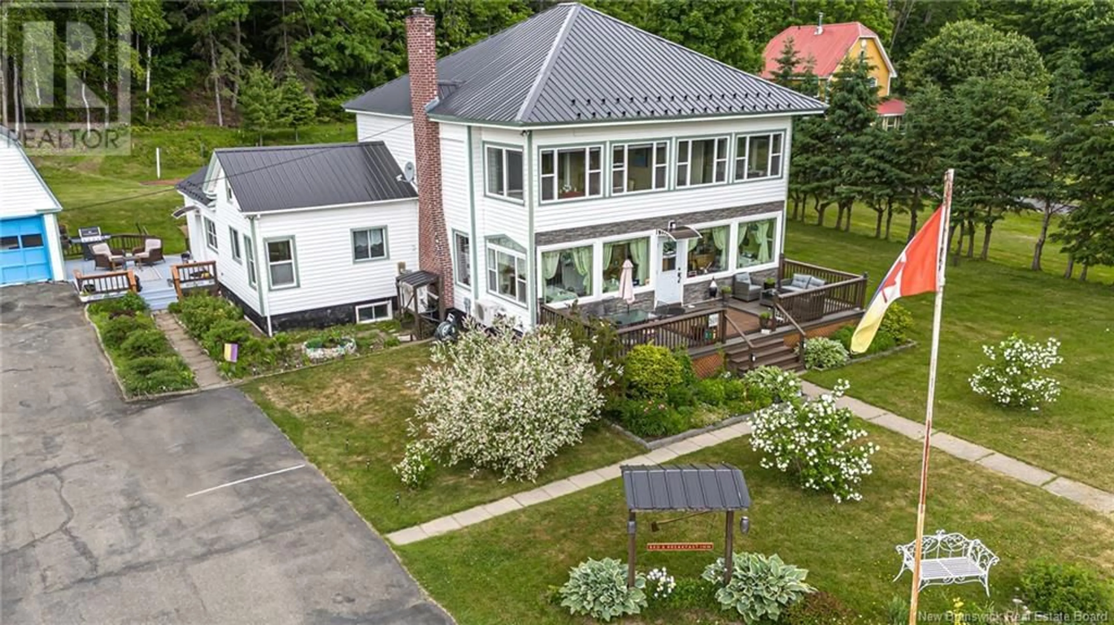 A pic from outside/outdoor area/front of a property/back of a property/a pic from drone, building for 519-531 OTIS DRIVE, Nackawic New Brunswick E6G1H6